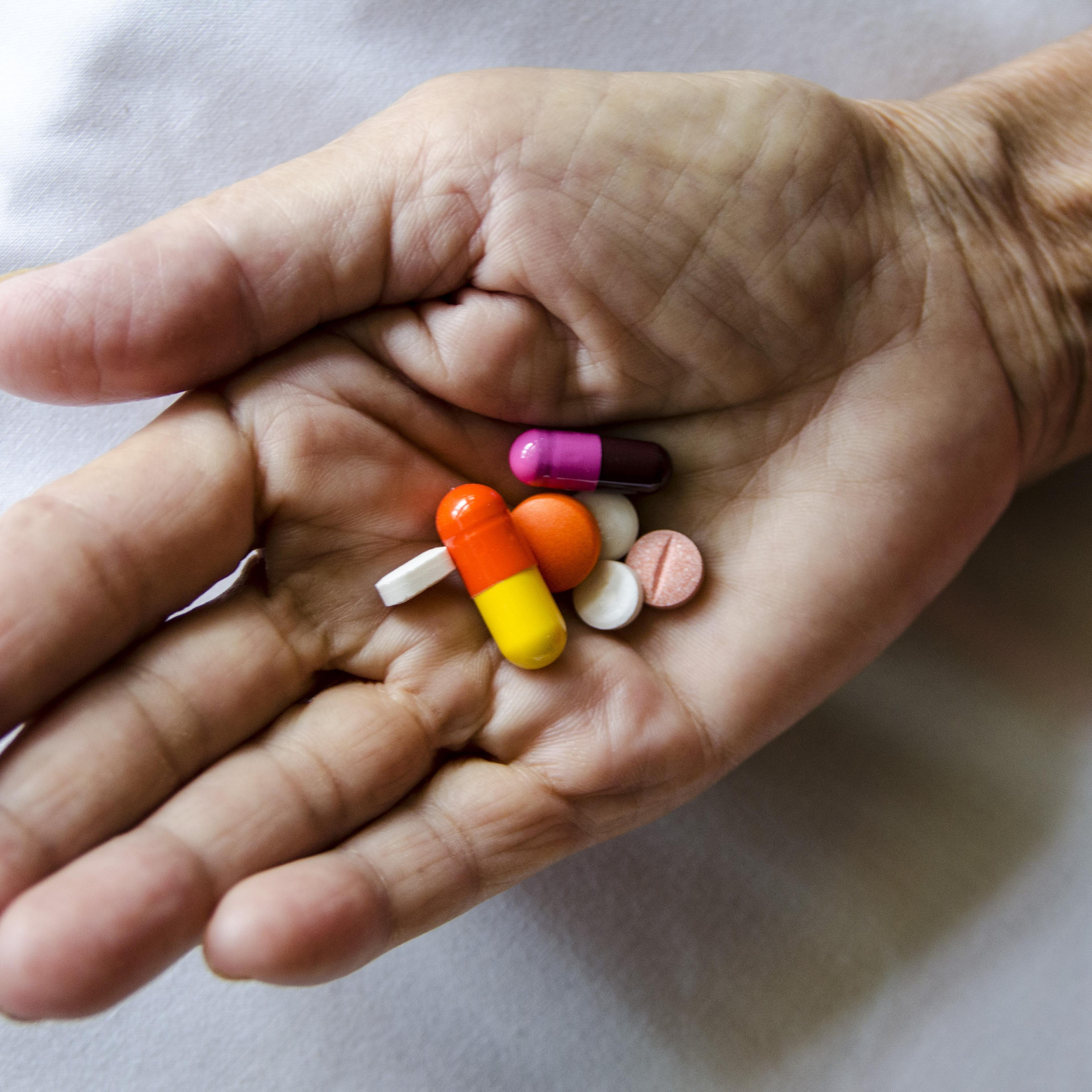 Human hand hold medicine