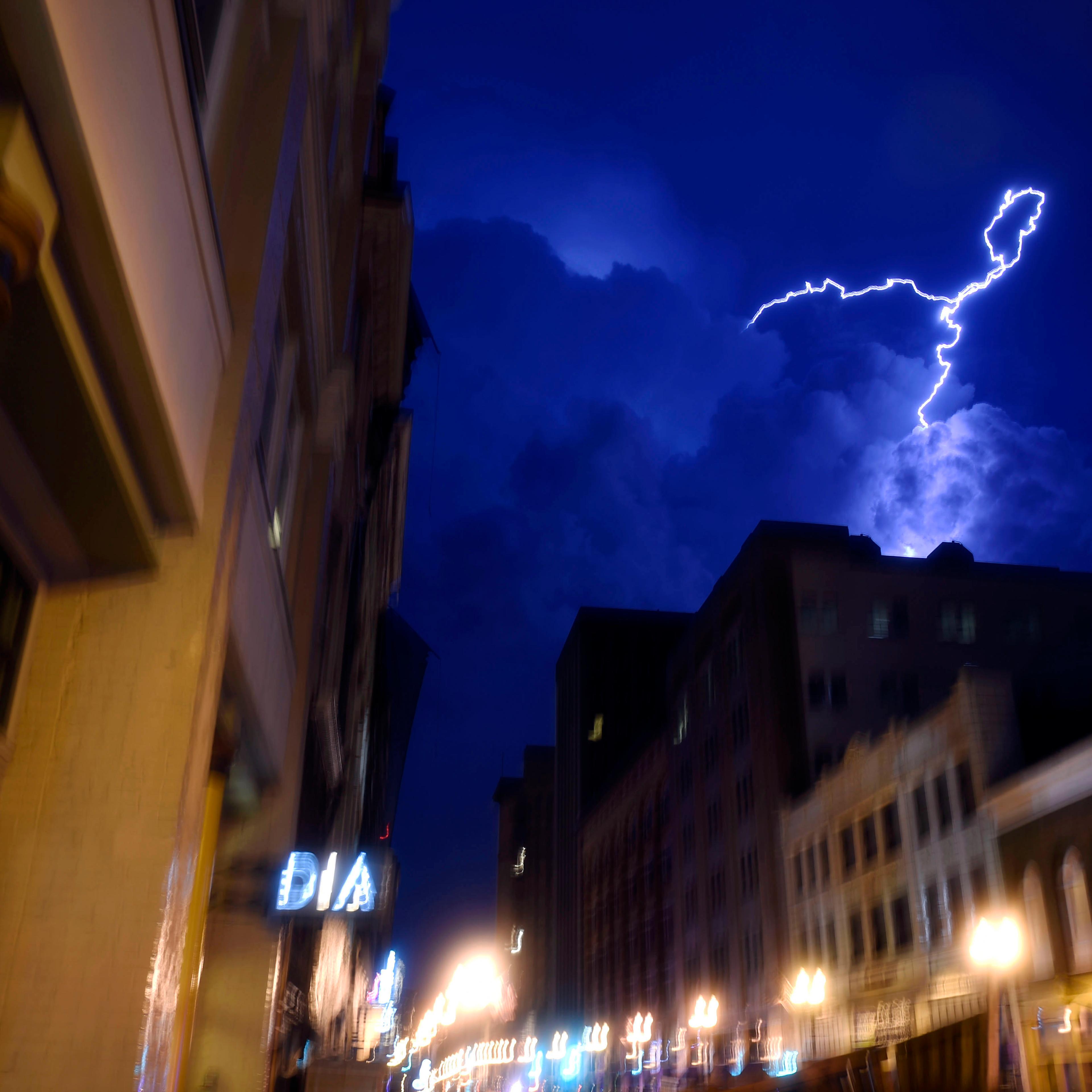 Lightning strikes over downtown in Knoxville, Tenn., on July 27, 2014.