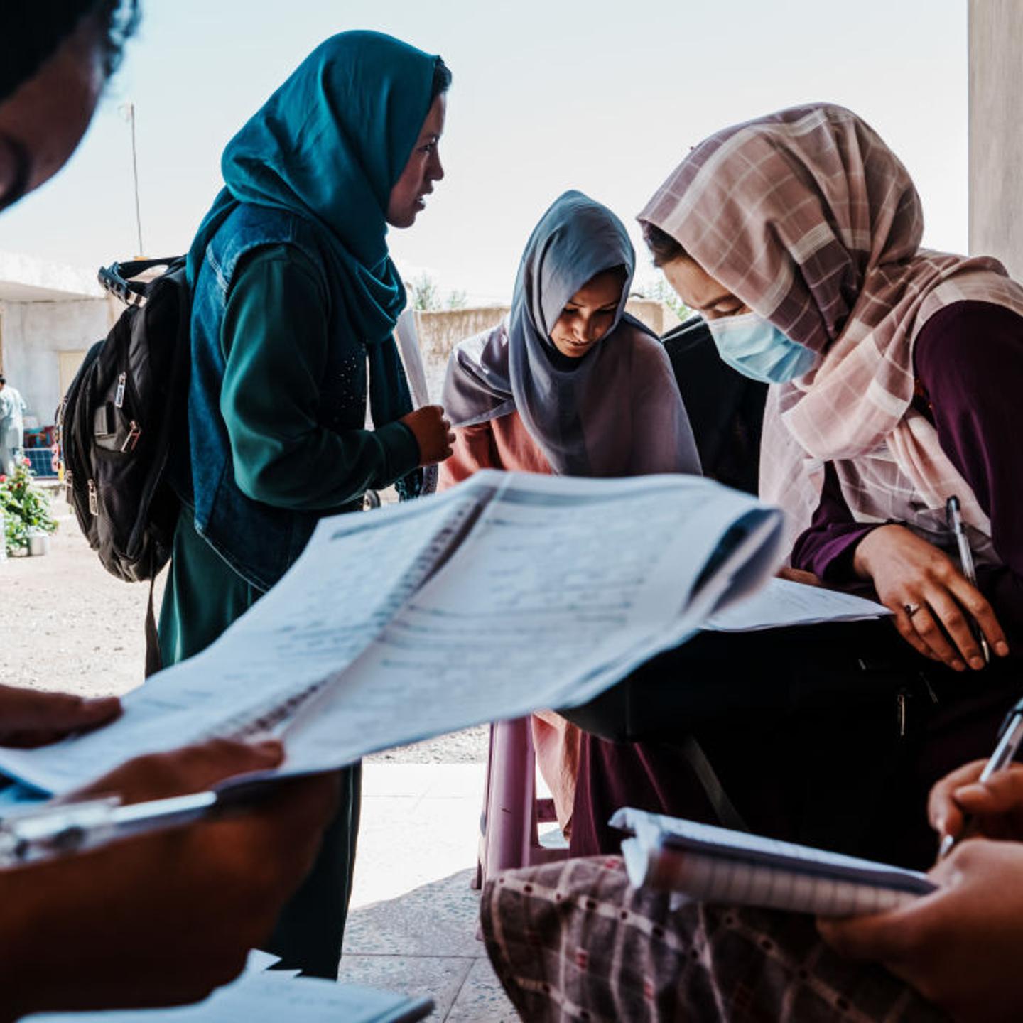 Meena Ibrahimi, 20, center, and other students are preparing and studying for the Kankor exam at a private tutoring center in Bamyan, Afghanistan, Friday, Sept. 23, 2022.
