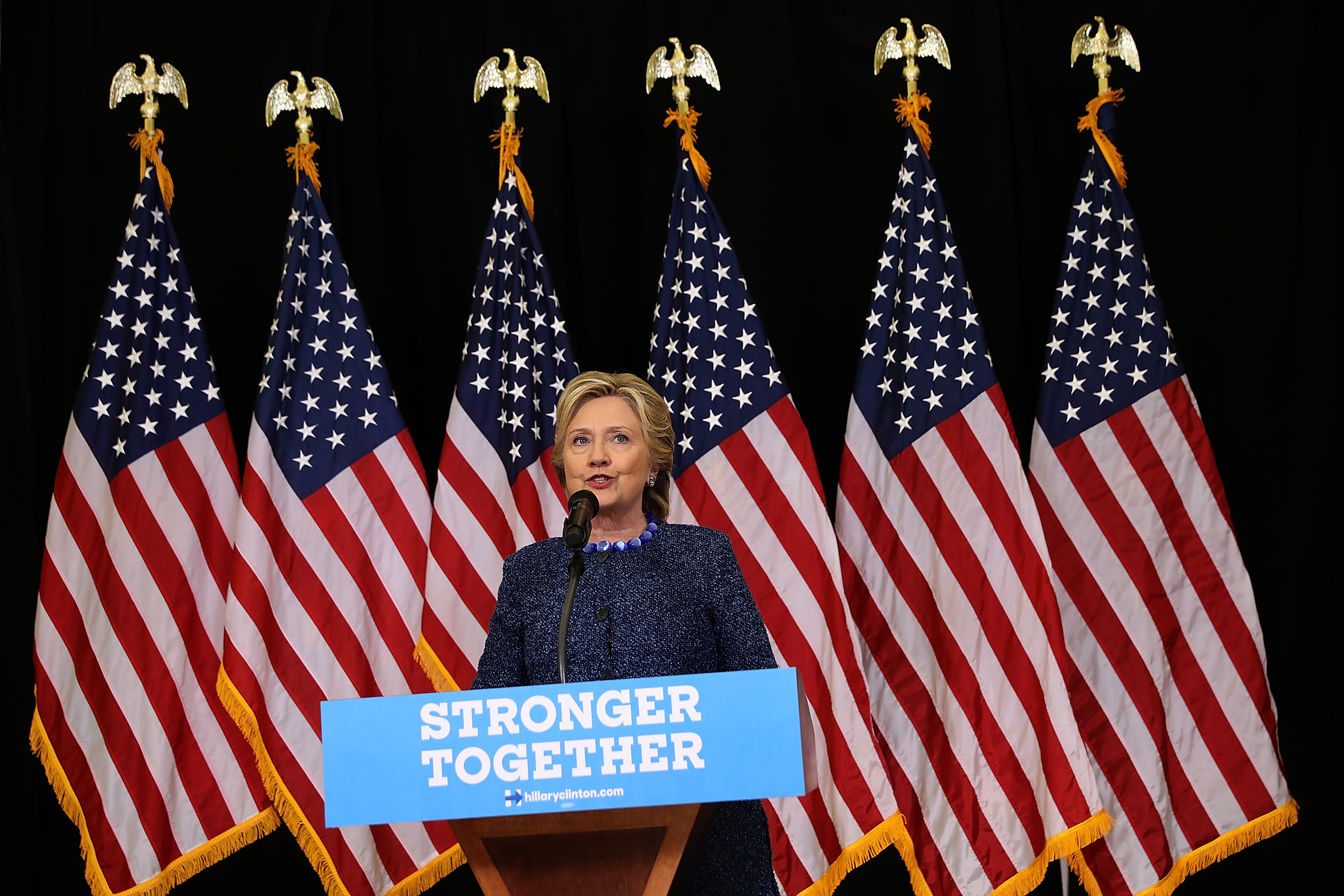 Democratic presidential nominee former Secretary of State Hillary Clinton speaks to reporters following a campaign rally at Roosevelt High School in Des Moines, Iowa, on Oct. 28, 2016.