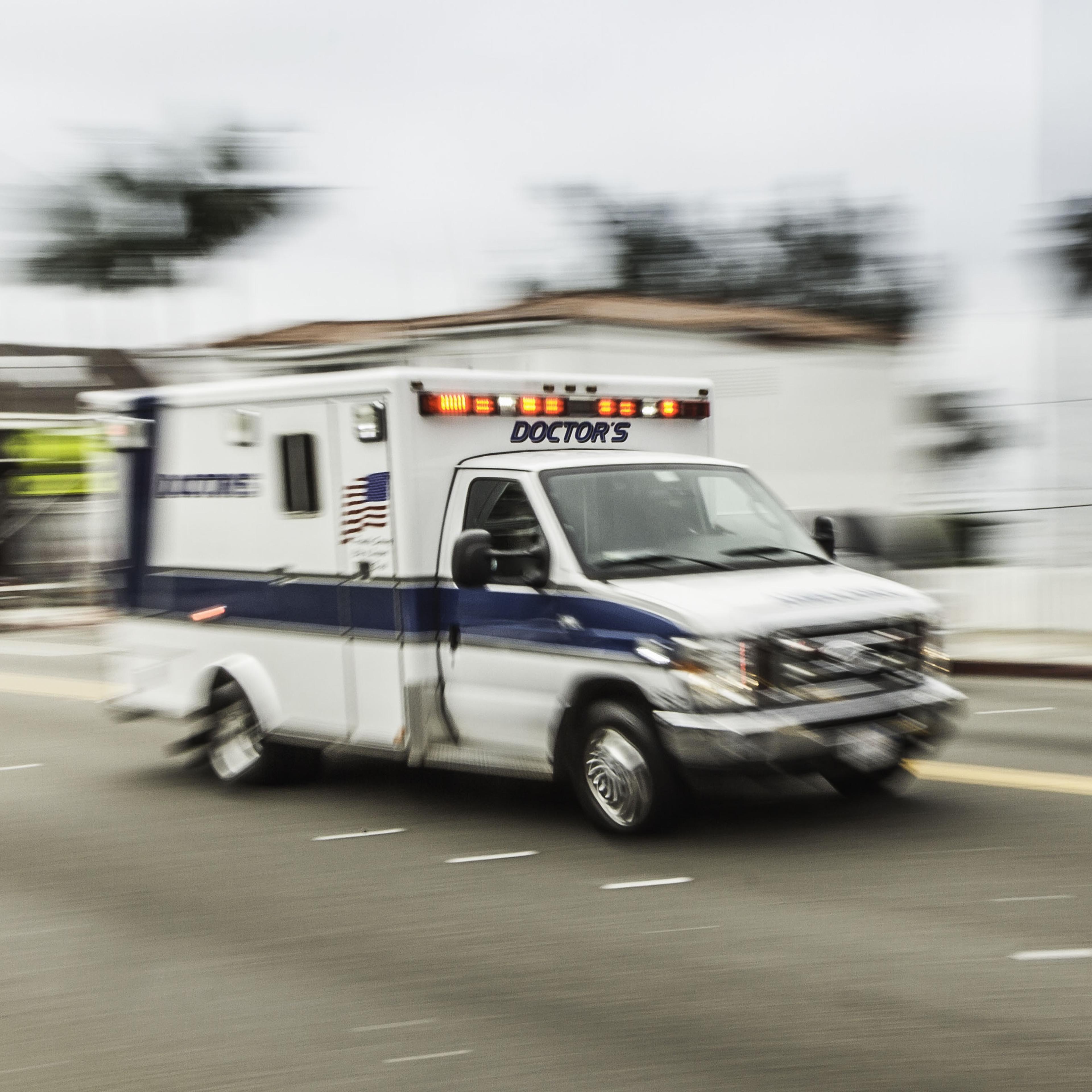Blurred motion shot of speeding ambulance