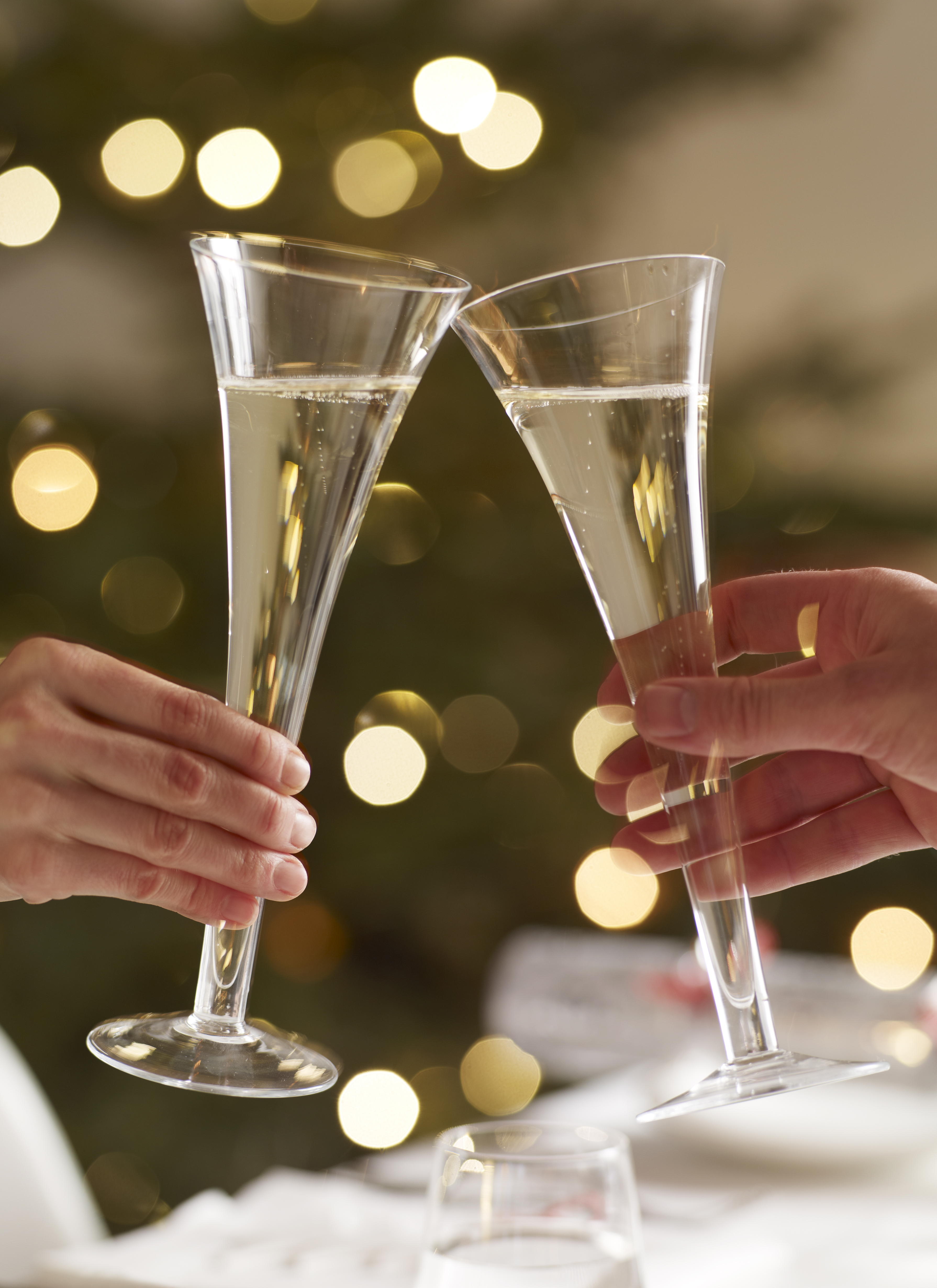 couple toasting with champaigne glasses