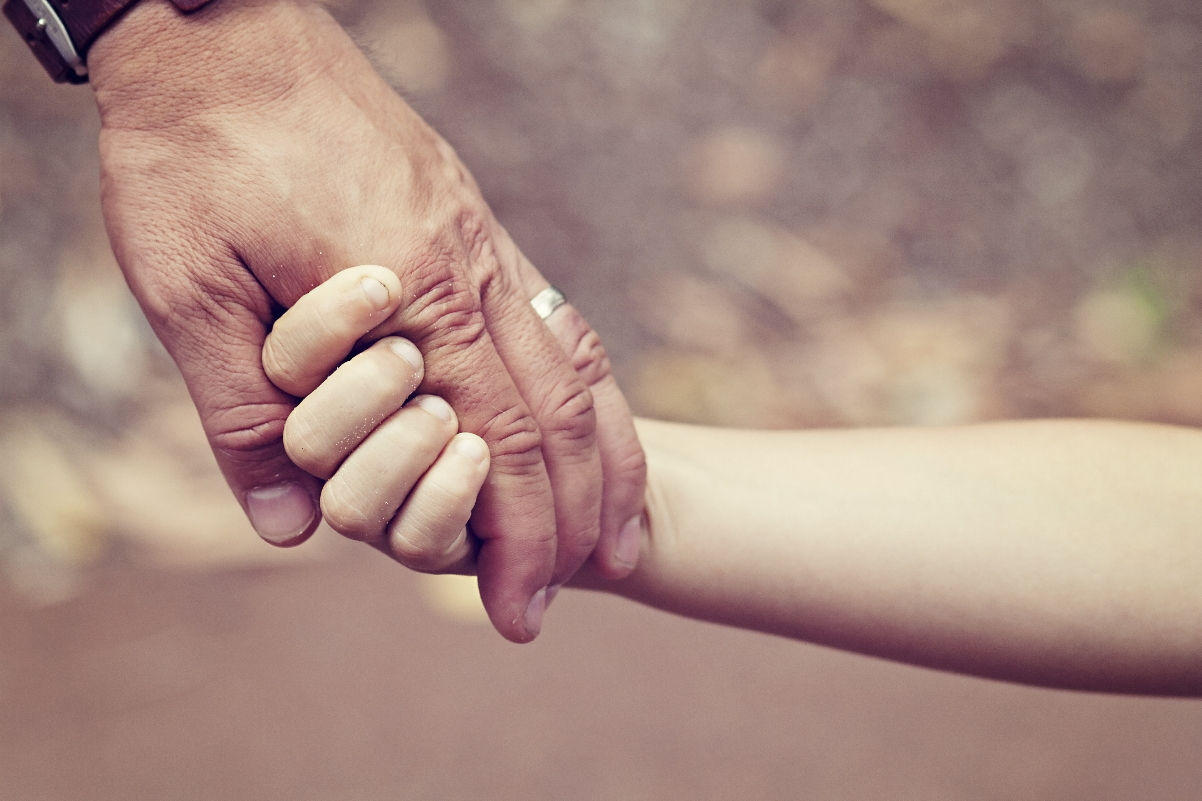 Father and daughters hands
