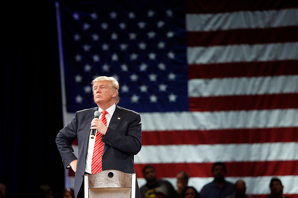 Republican presidential candidate Donald Trump speaks to supporters during a town hall meeting at the Tampa Convention Center in Tampa , Fla., on March 14, 2016.