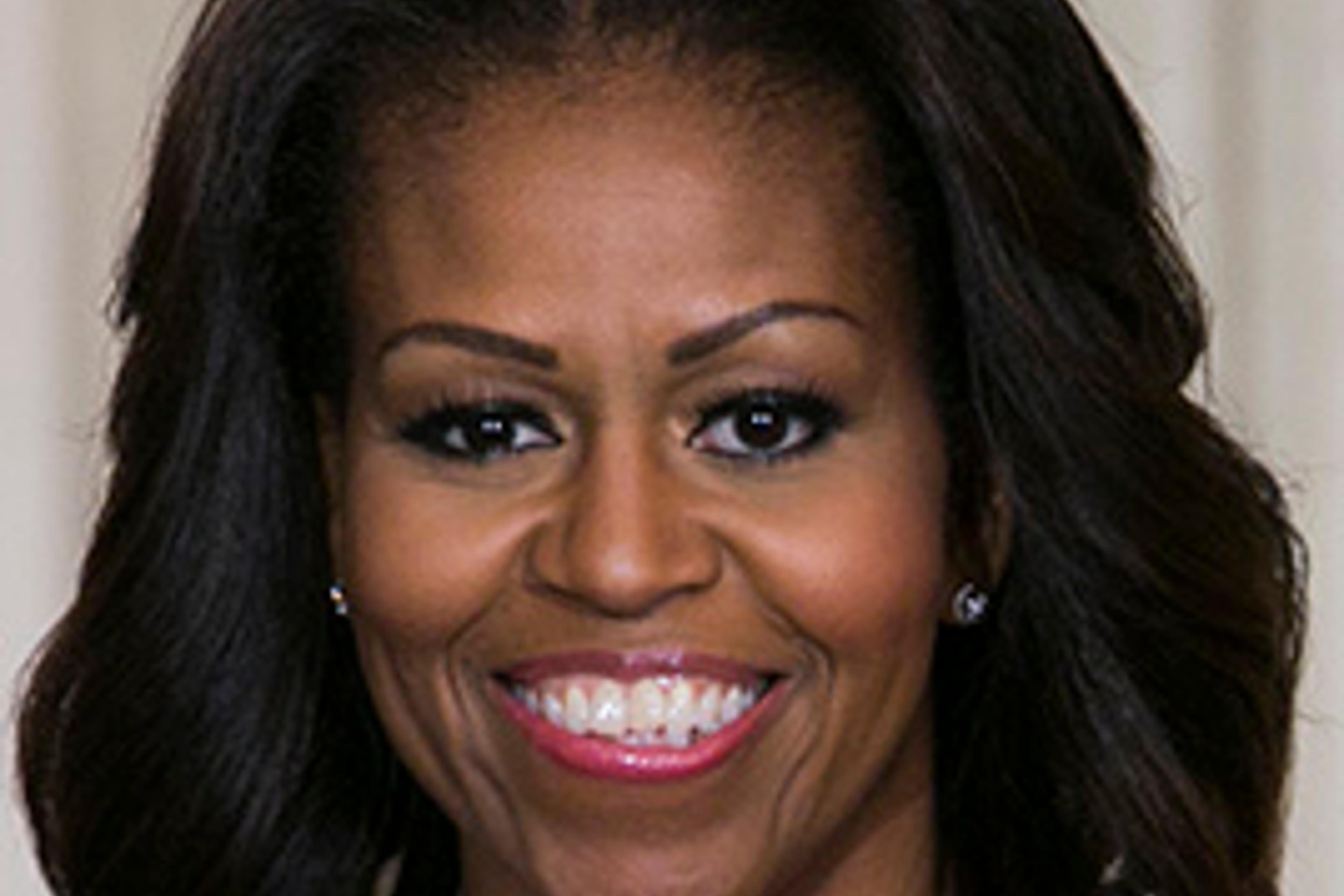 First Lady Michelle Obama participates in announcing that Sesame Workshop and the Produce Marketing Association joined the Partnership for a Healthier America in a two-year agreement to help promote healthy foods to children on Oct. 30, 2013 in Washingto