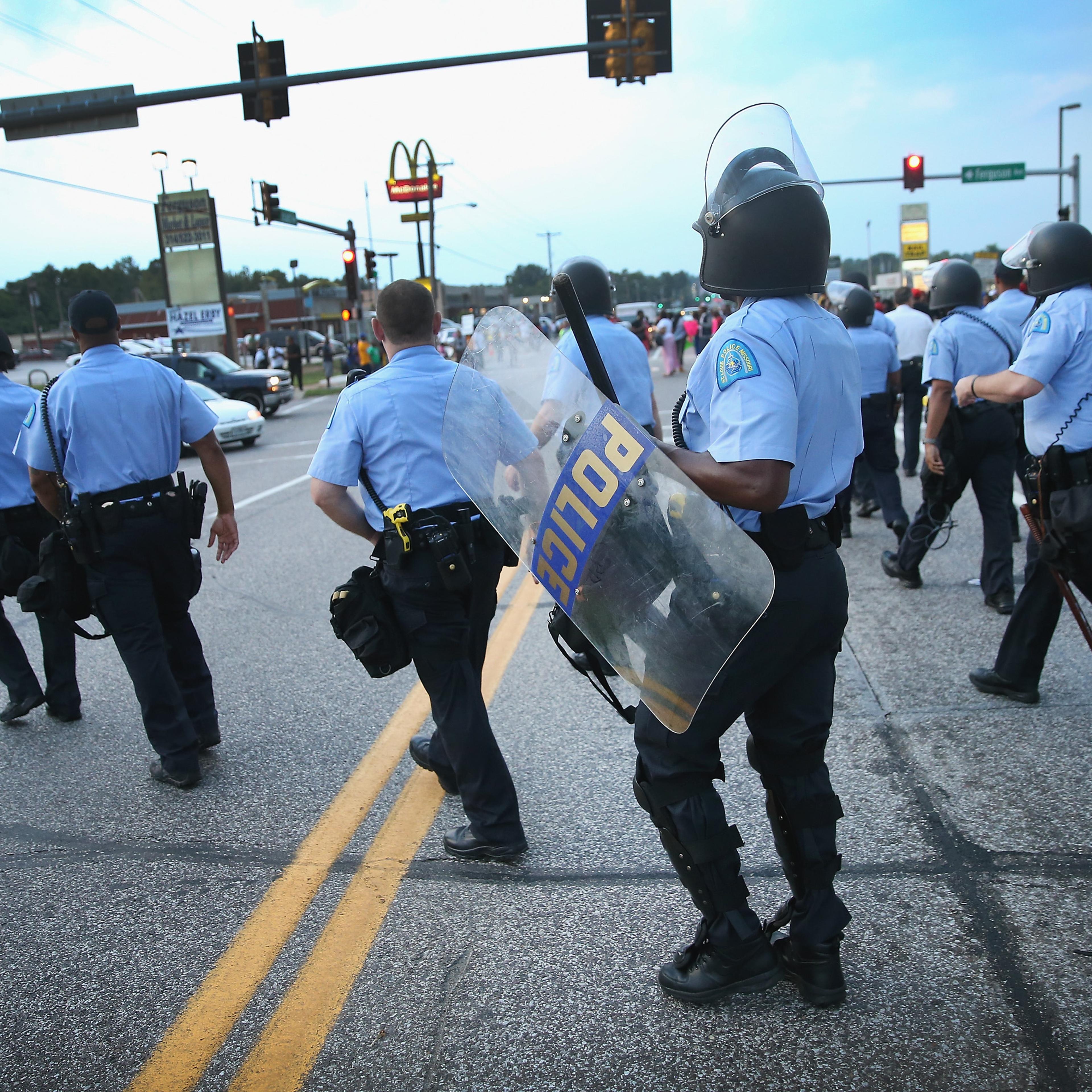 Police are deployed to keep peace along Florissant Avenue on Aug. 16, 2014 in Ferguson, Missouri.