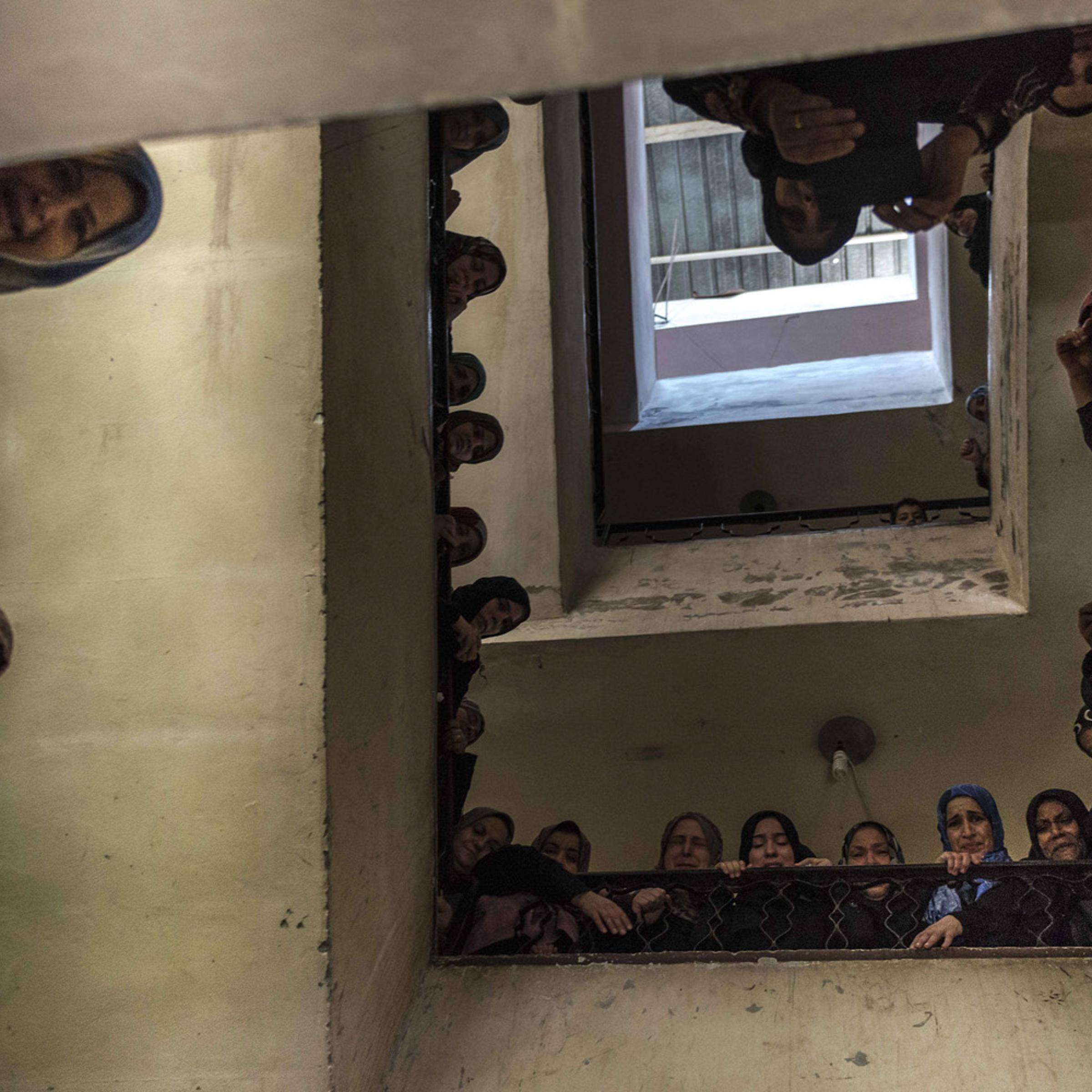 Women grieve during the funeral of Islamic Brigades fighter Abdalla Ismail al Buheisi, in Deir Al Balah, on the Gaza Strip.