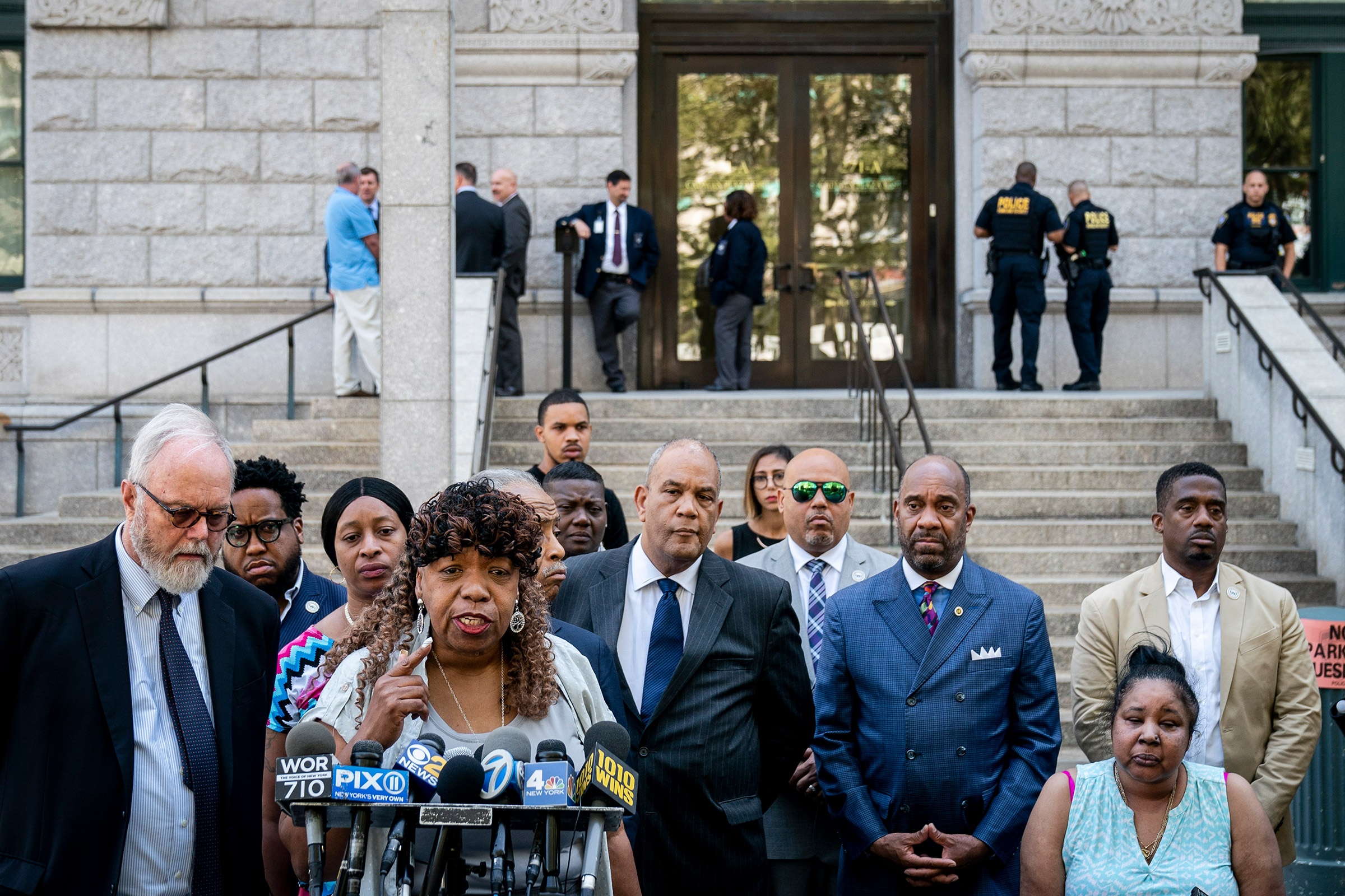 Gwen Carr, mother of the late Eric Garner, speaks to the press outside the U.S. Attorney's office