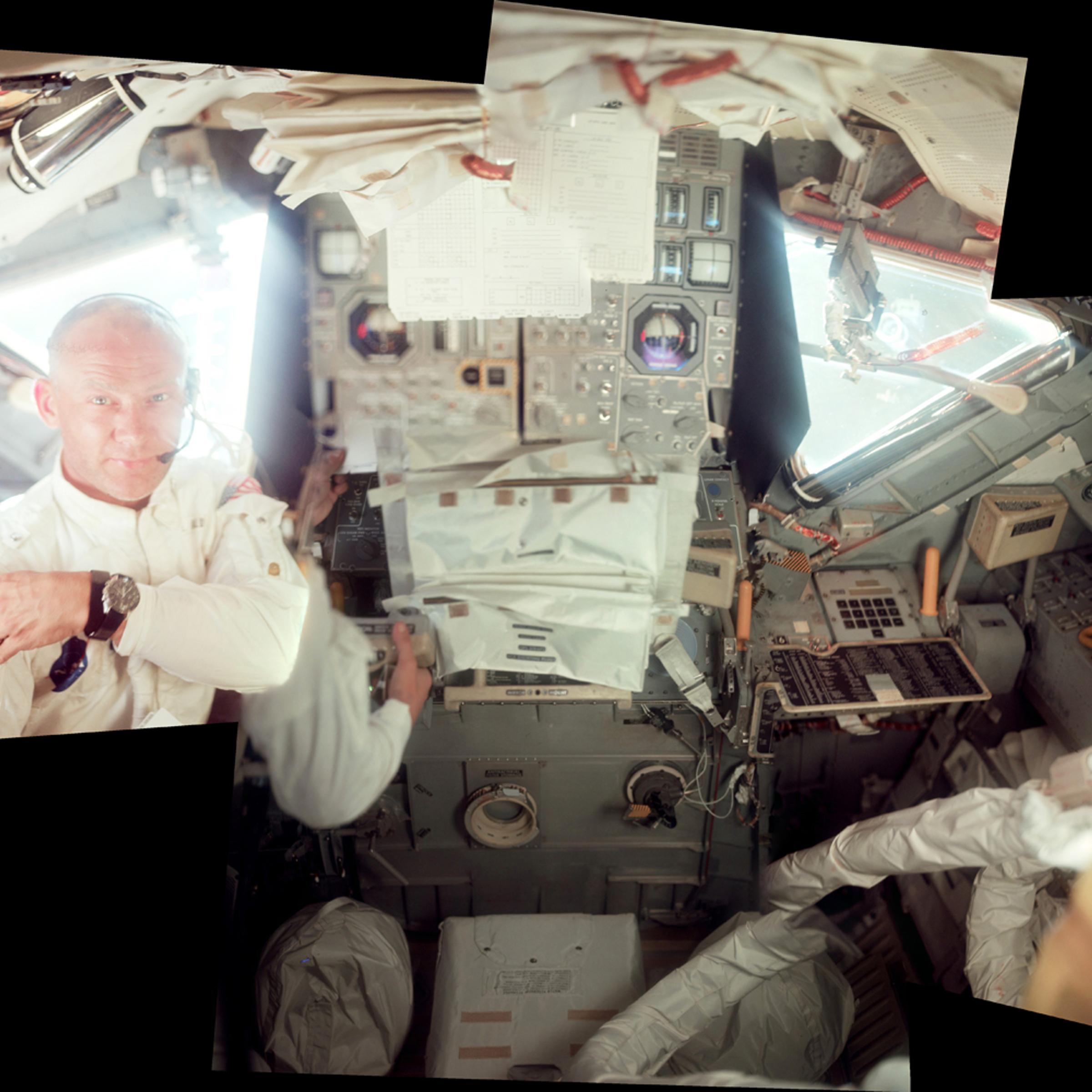 Buzz Aldrin during the initial inspection of the Lunar Module (LM) at about 055:41.