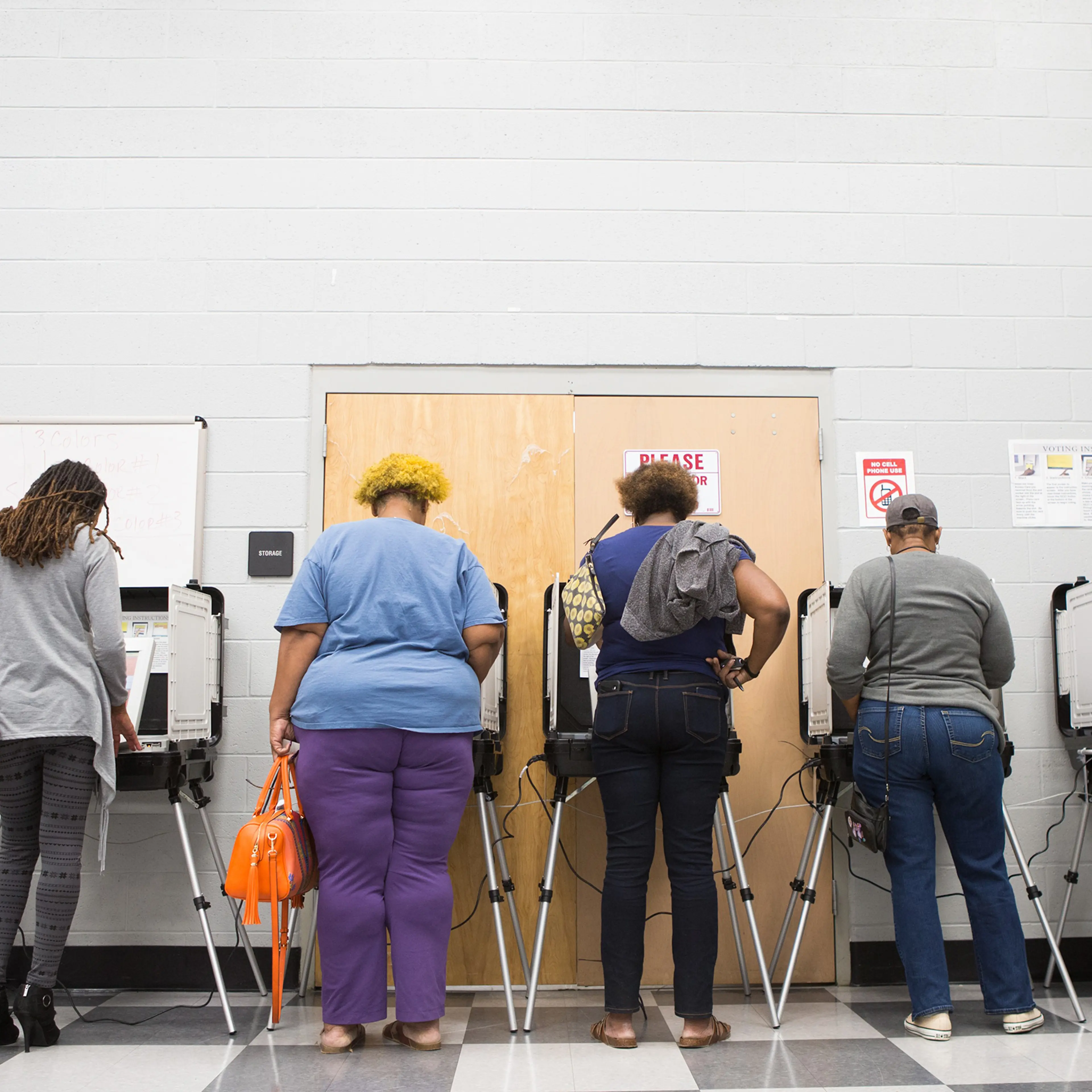 Voters cast their ballots during early voting in Atlanta on Oct. 18