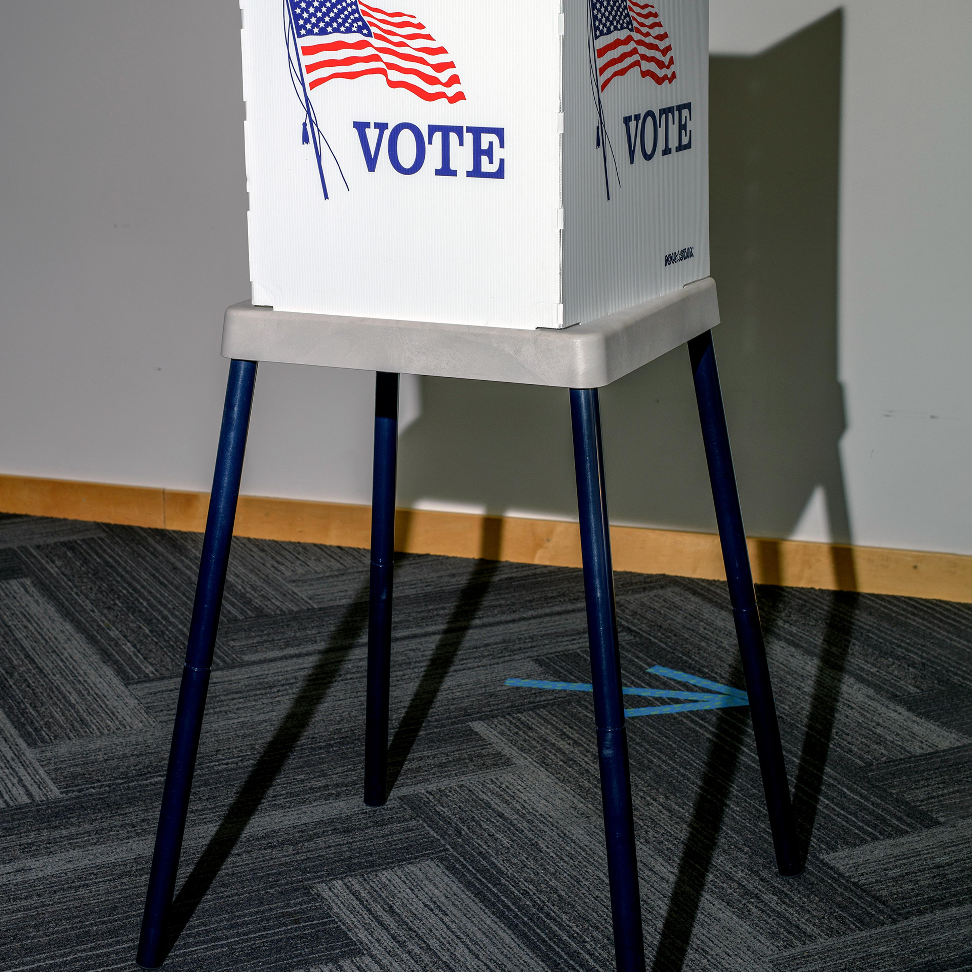 A voting booth is shown set up at the Ames Public Library on Primary Election Day on June 7, 2022 in Ames, Iowa.