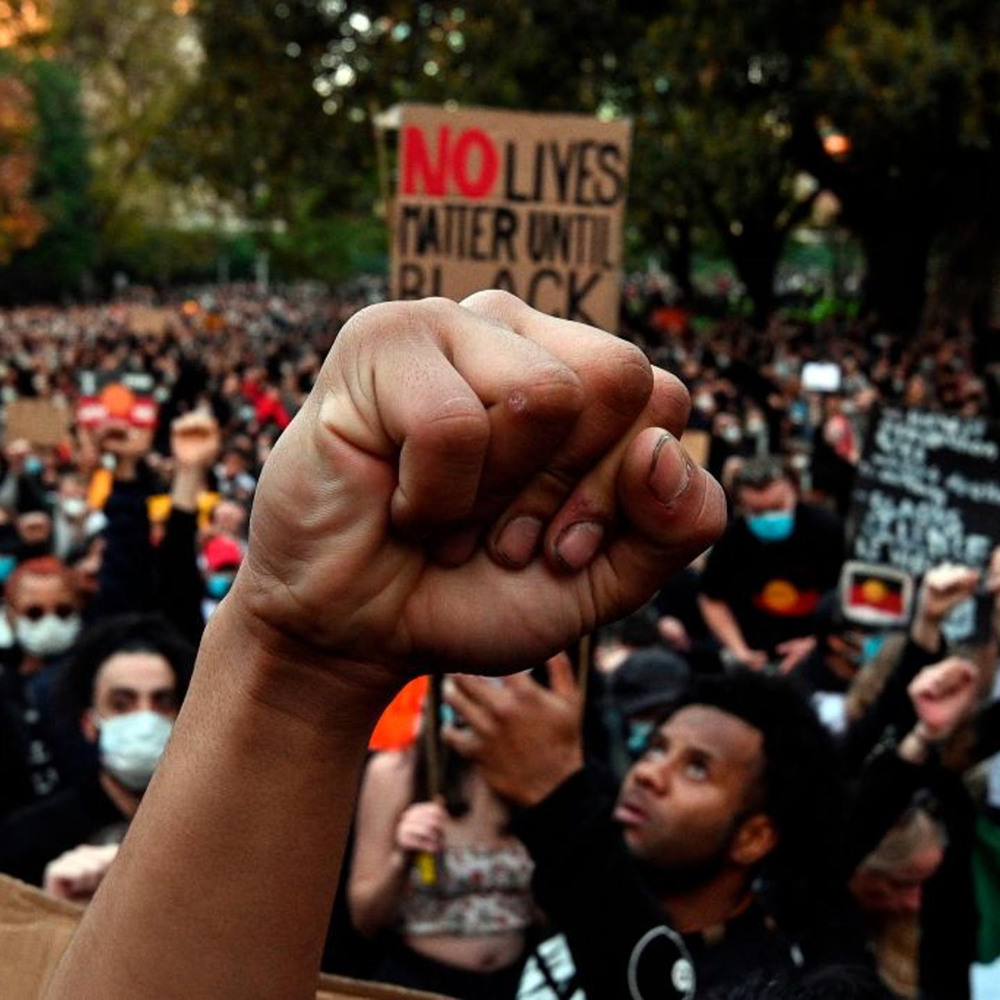 TOPSHOT-AUSTRALIA-US-POLITICS-RACE-UNREST