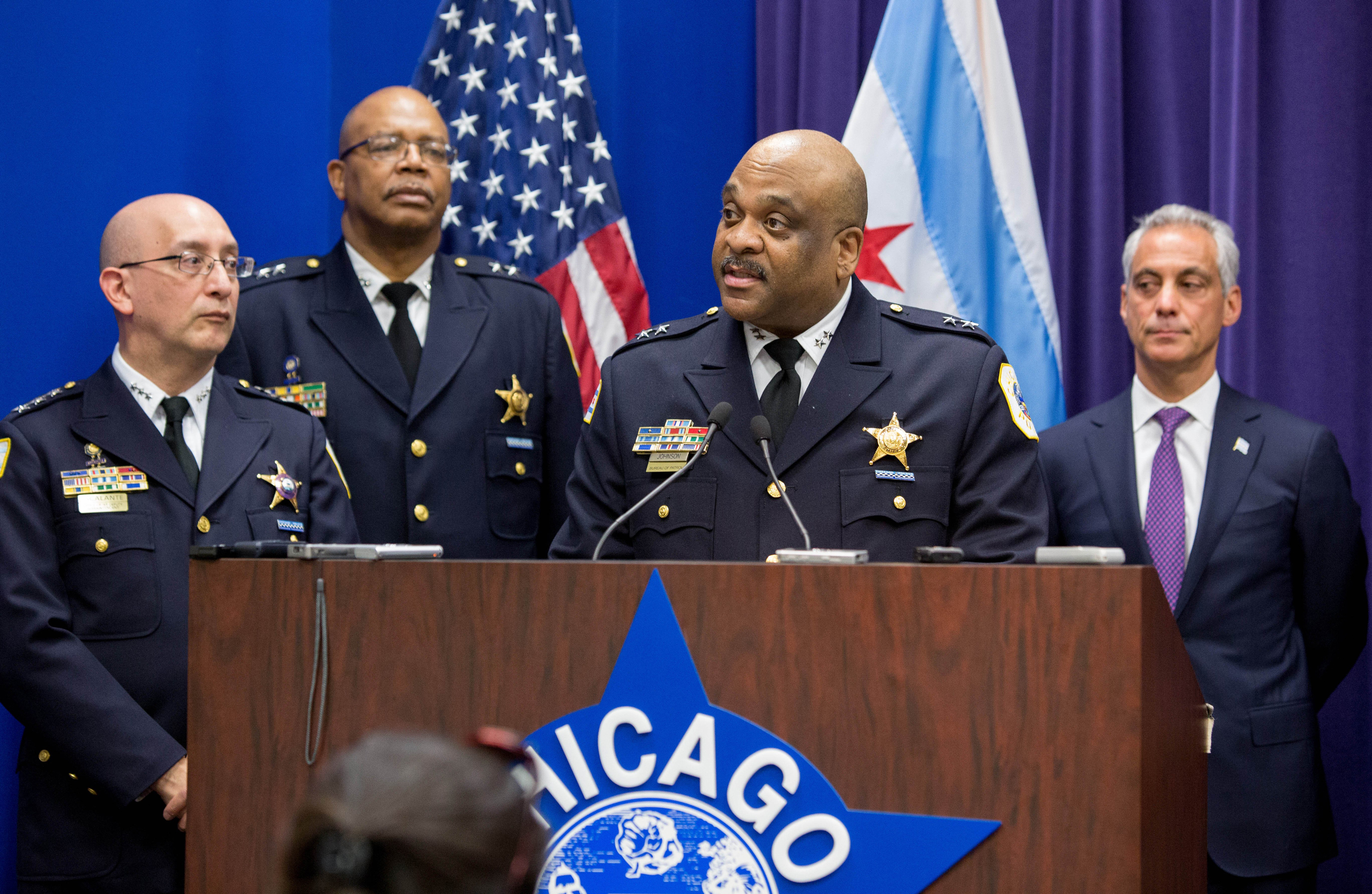 Eddie Johnson speaks to the media after Mayor Rahm Emanuel, right, announced that he was appointing him the interim superintendent of the Chicago Police Department at CPD Headquarters in Chicago on Monday, March 28, 2016. Johnson didn't apply for a chanc