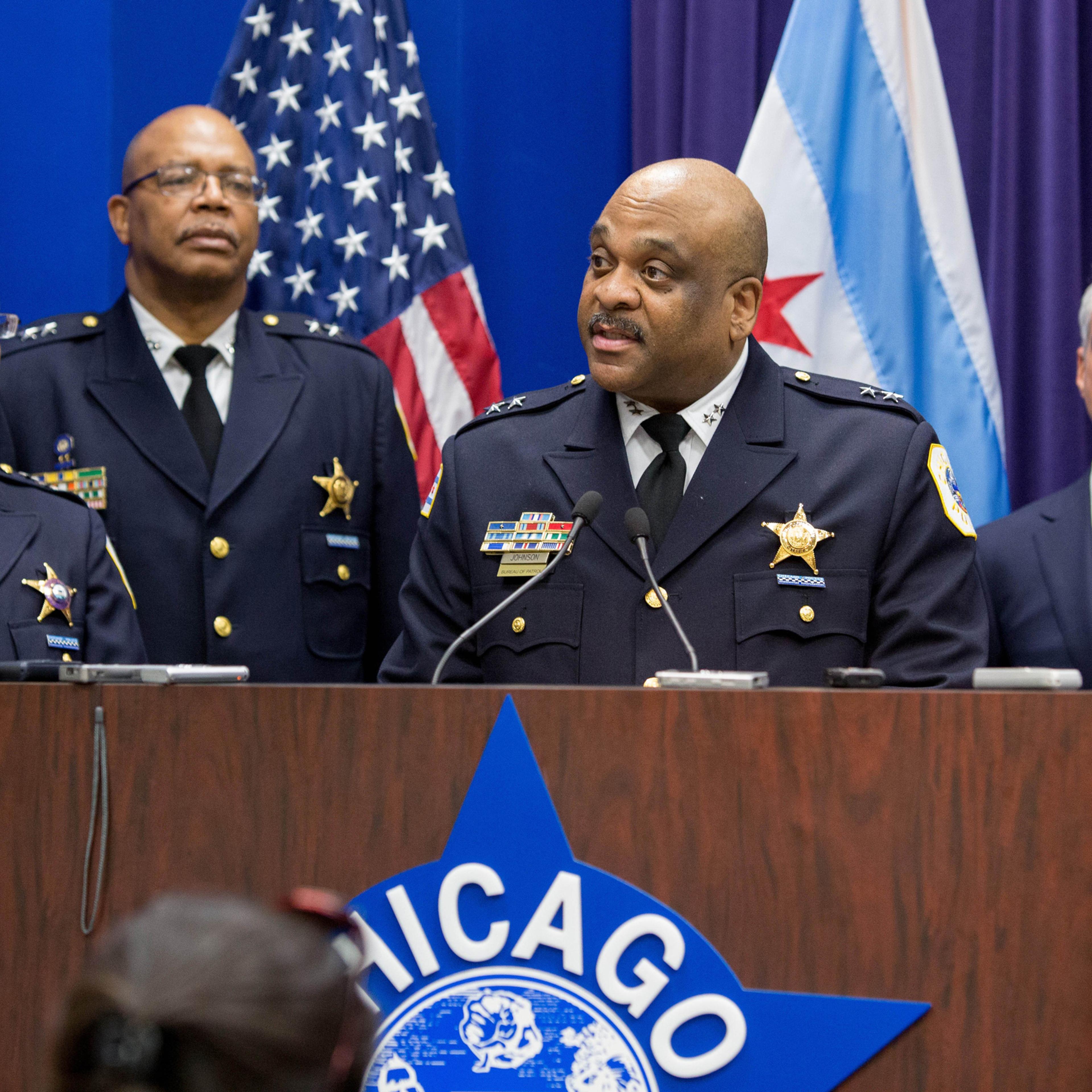 Eddie Johnson speaks to the media after Mayor Rahm Emanuel, right, announced that he was appointing him the interim superintendent of the Chicago Police Department at CPD Headquarters in Chicago on Monday, March 28, 2016. Johnson didn't apply for a chanc