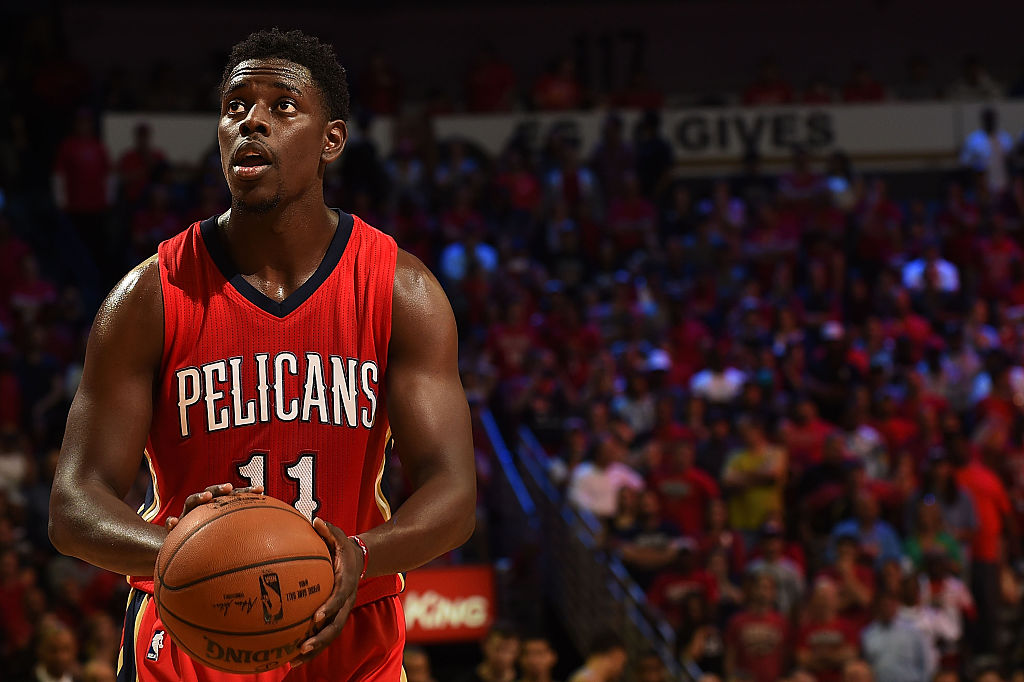 Jrue Holiday of the New Orleans Pelicans shoots a free throw during a game against the San Antonio Spurs at the Smoothie King Center on April 15, 2015 in New Orleans, Louisiana.