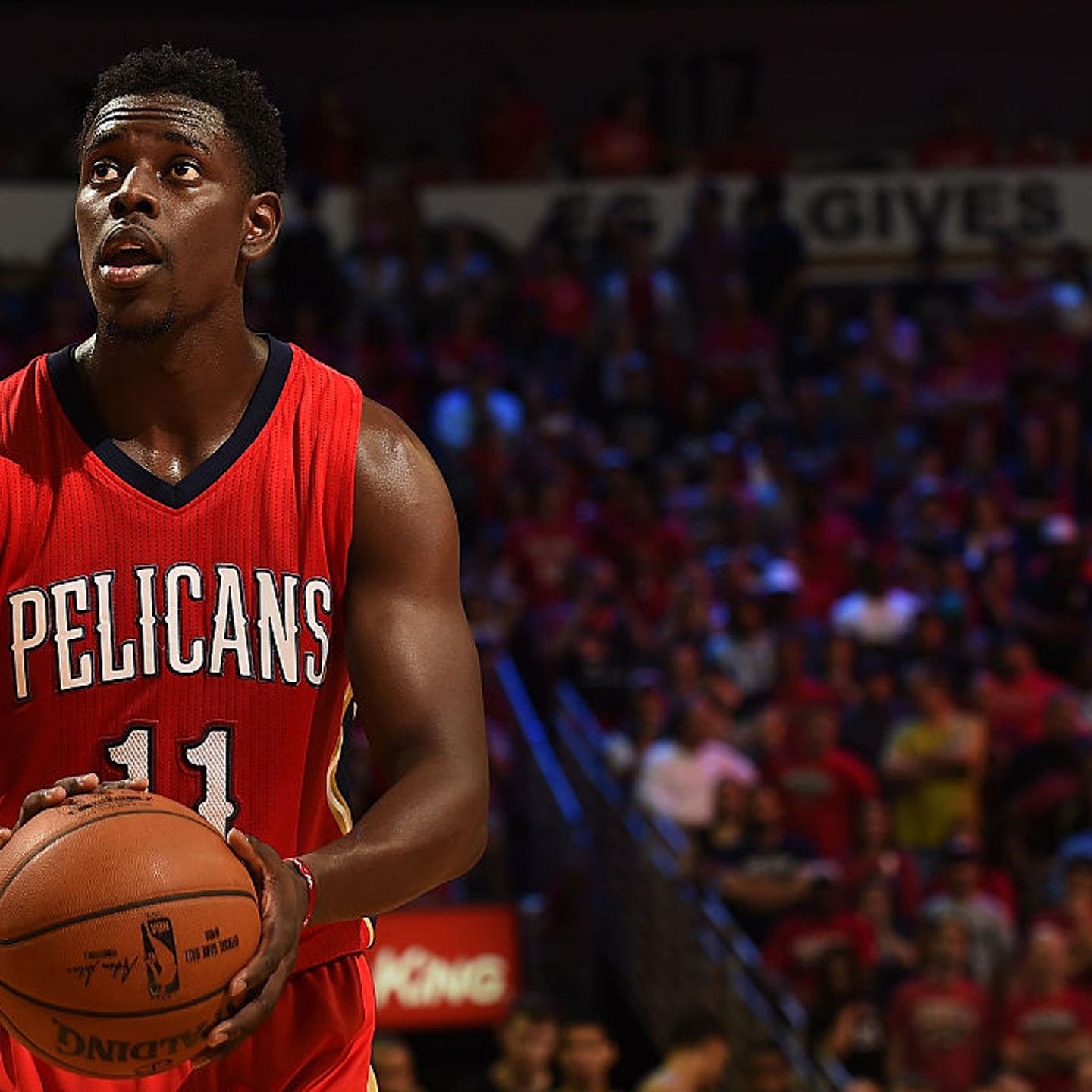Jrue Holiday of the New Orleans Pelicans shoots a free throw during a game against the San Antonio Spurs at the Smoothie King Center on April 15, 2015 in New Orleans, Louisiana.