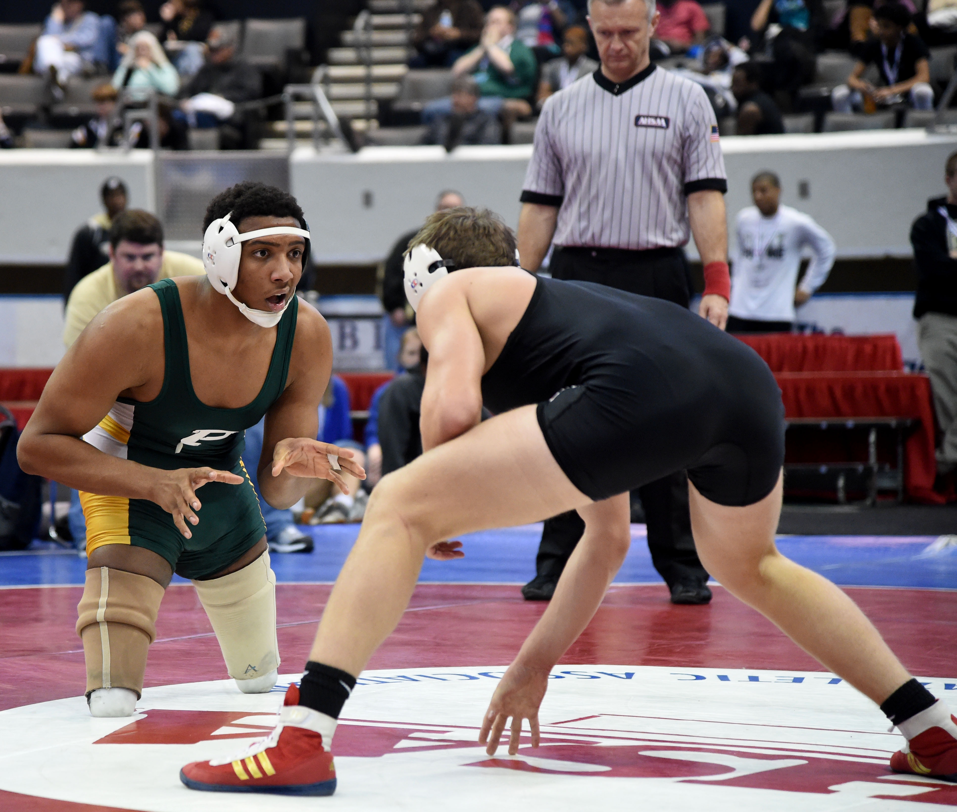 Pelham wrestler overcomes handicap to chase perfection