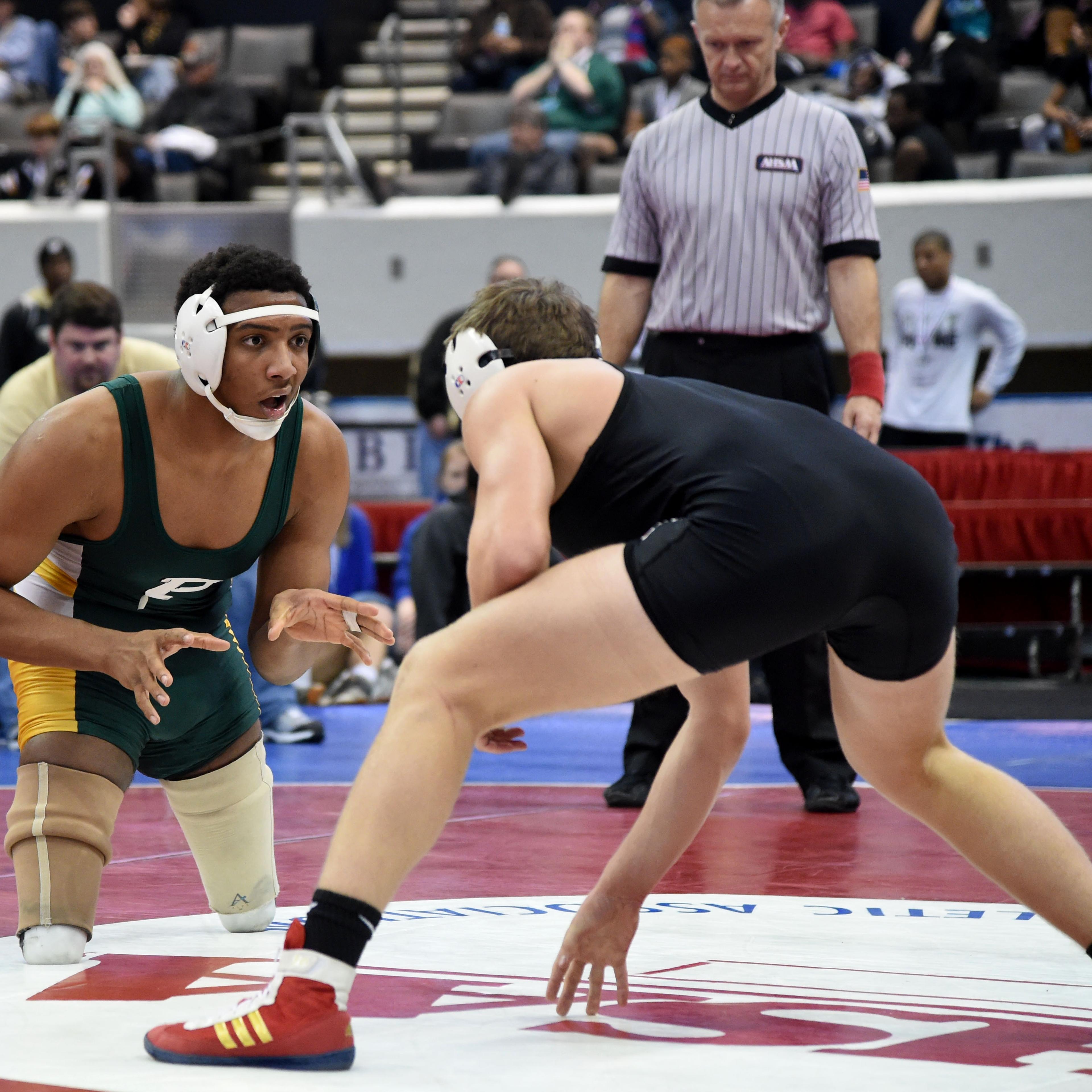 Pelham wrestler overcomes handicap to chase perfection