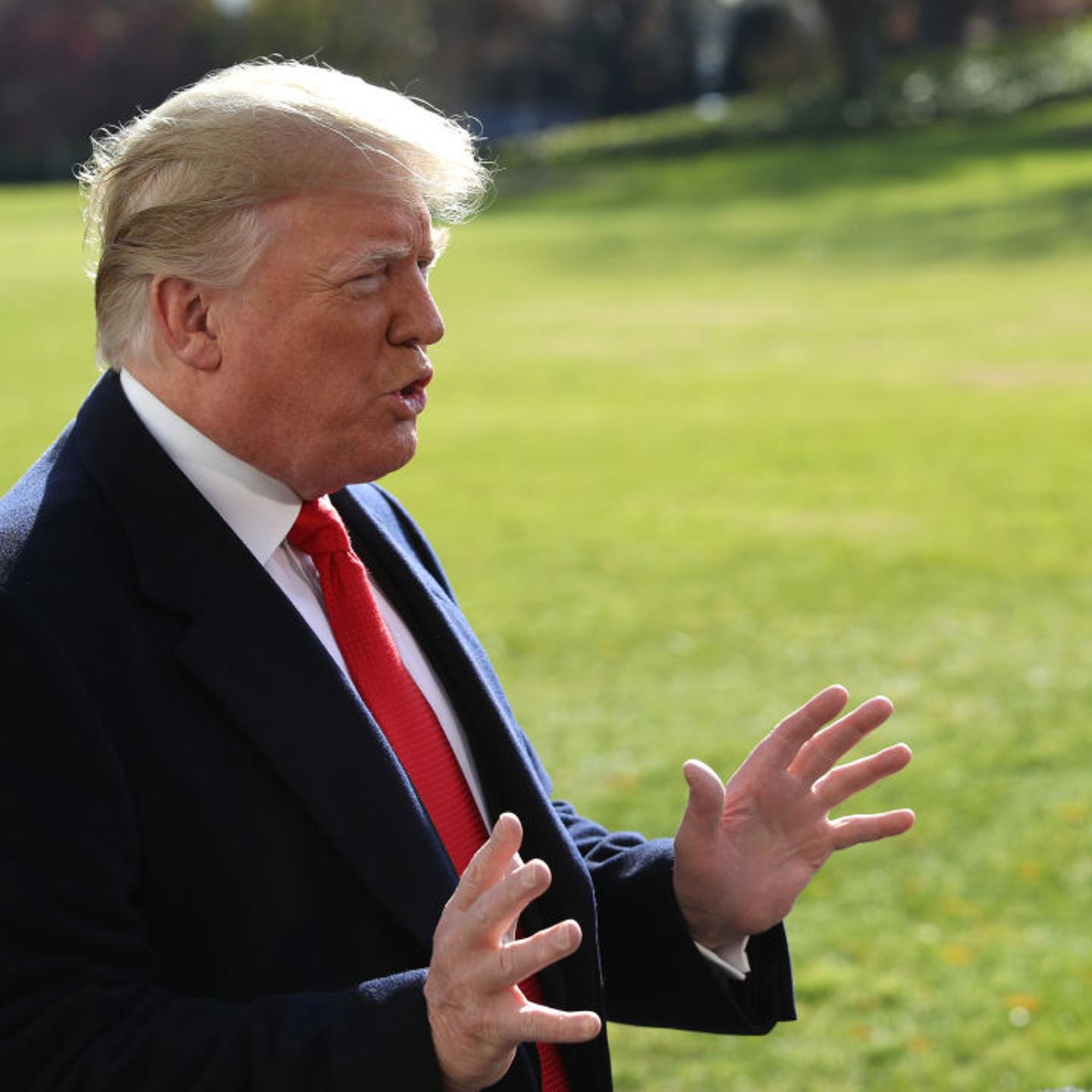 President Donald Trump speaks with the media