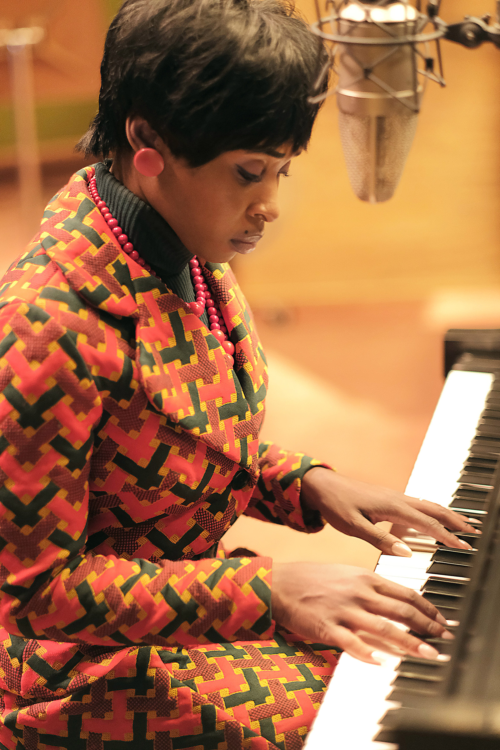 Aretha (Erivo) presides over the piano at FAME Studios