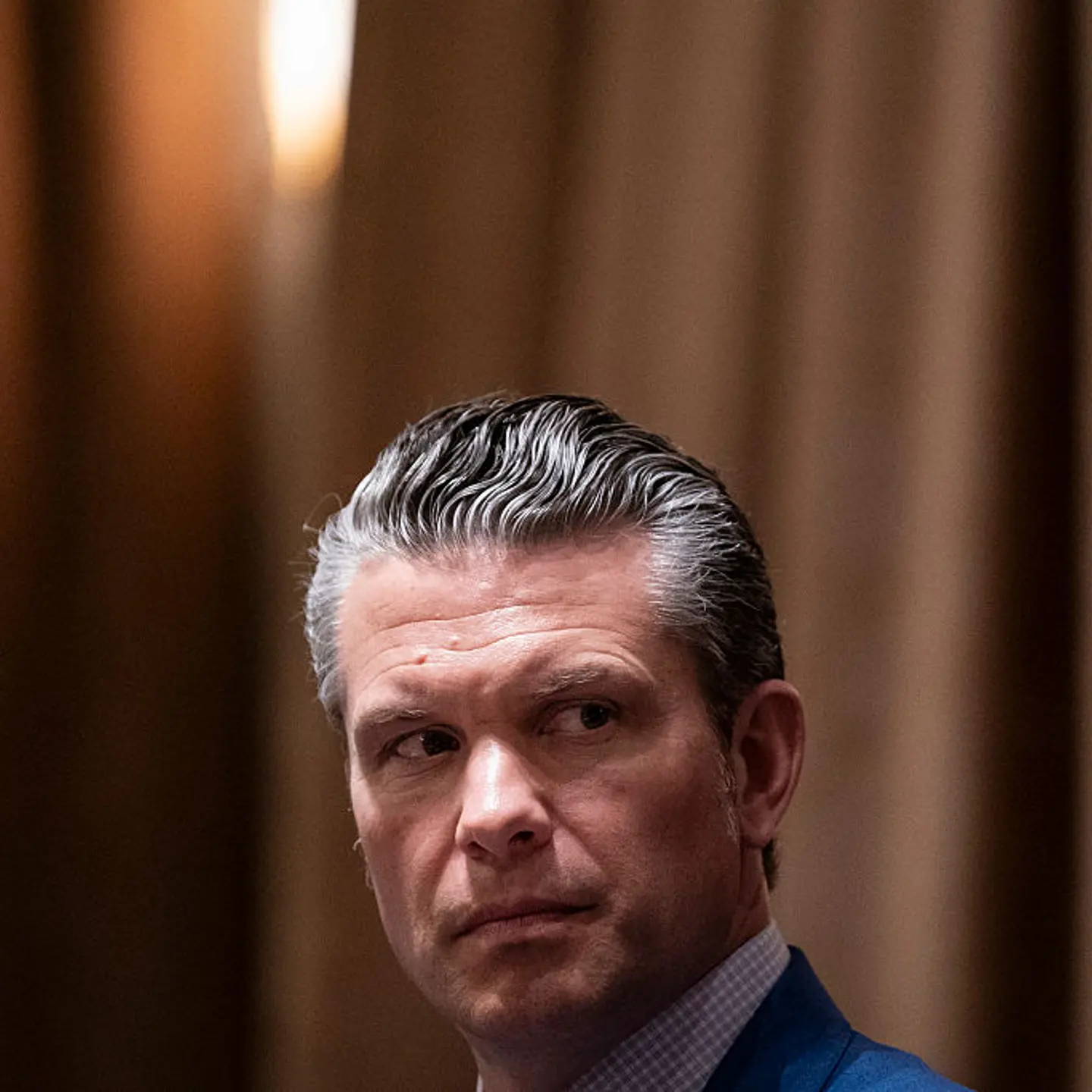 Defense Secretary Pete Hegseth listens during a cabinet meeting with President Donald Trump at the White House in Washington, D.C., on April 10, 2025.