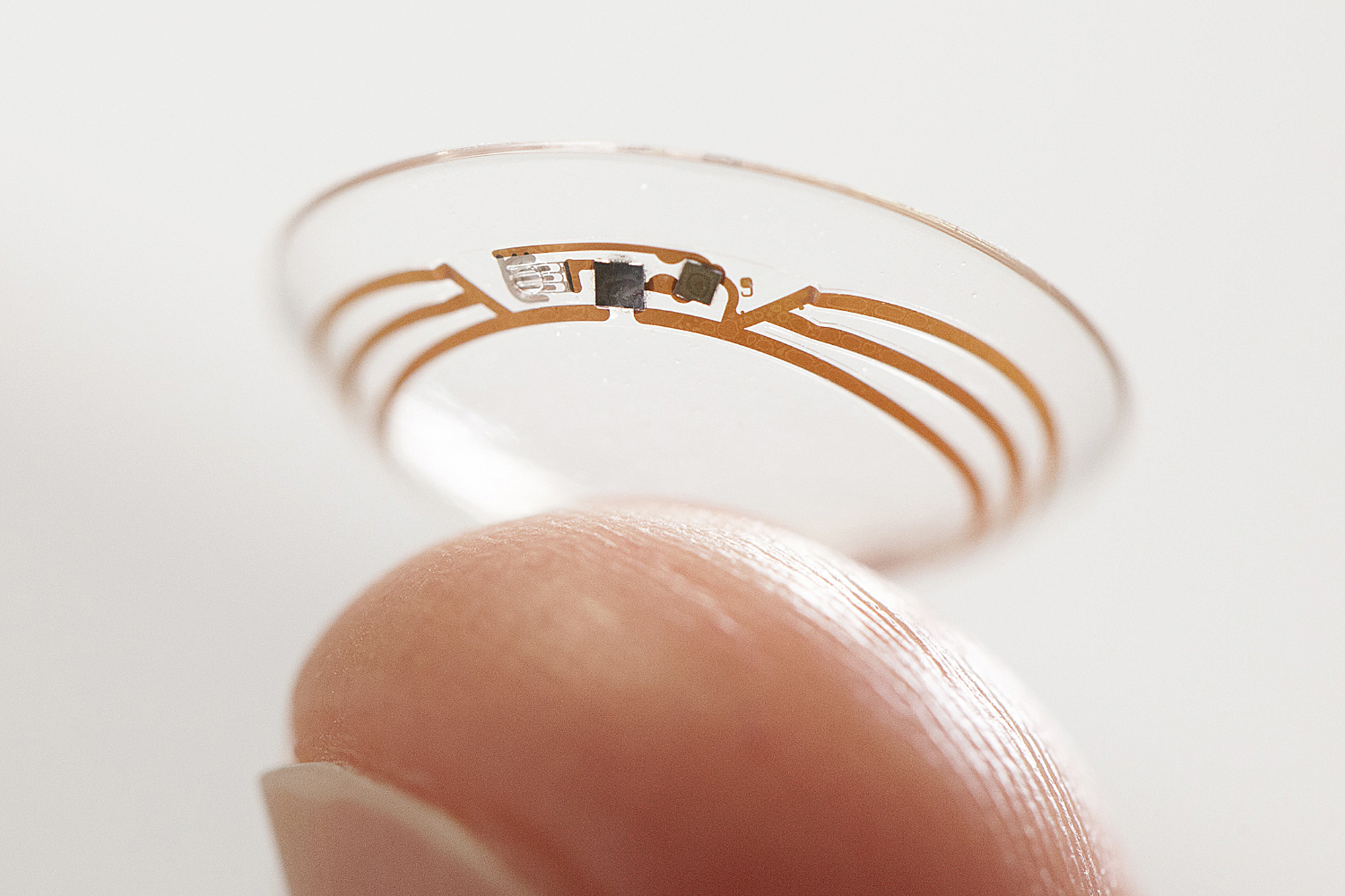 This undated photo released by Google shows a contact lens Google is testing to explore tear glucose.