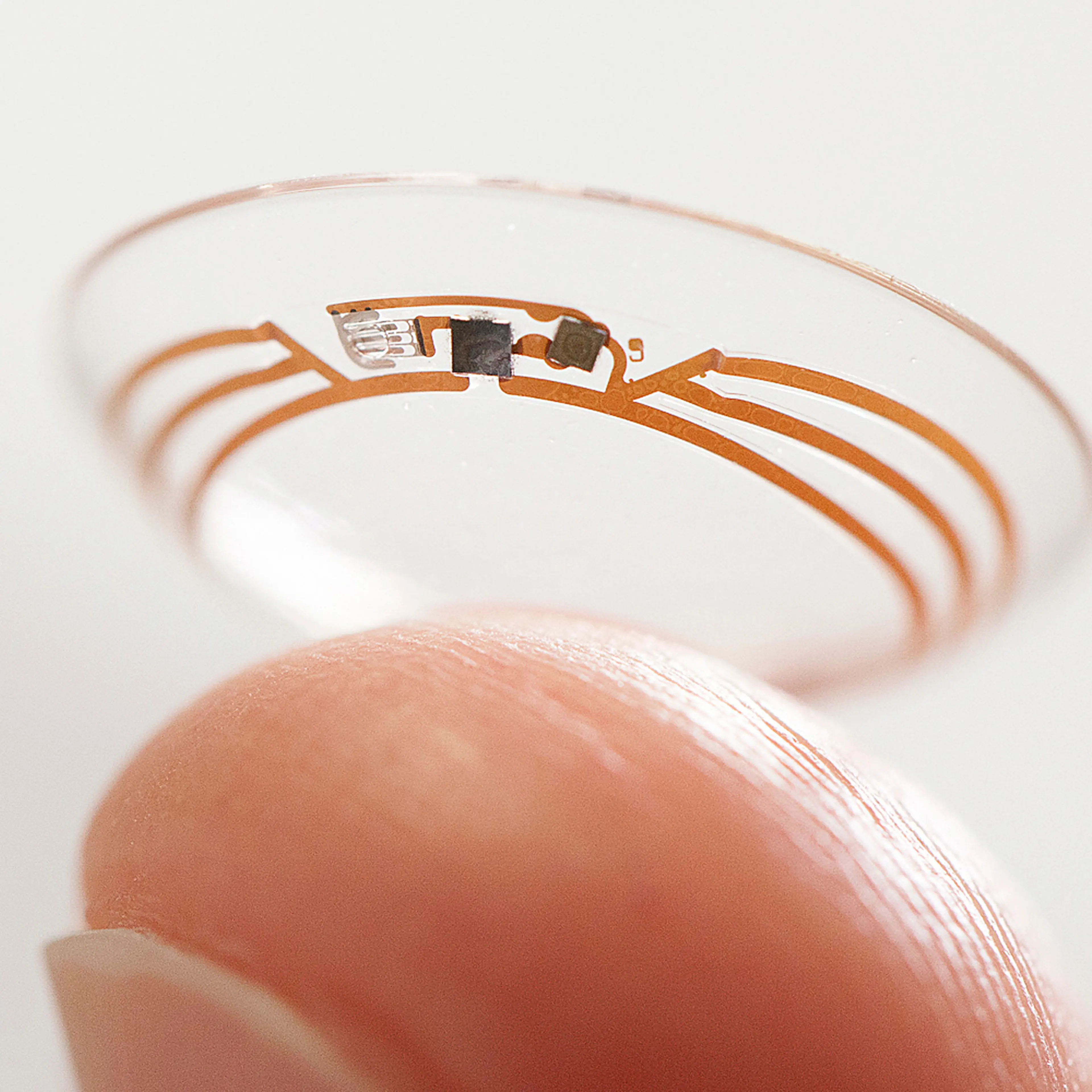 This undated photo released by Google shows a contact lens Google is testing to explore tear glucose.