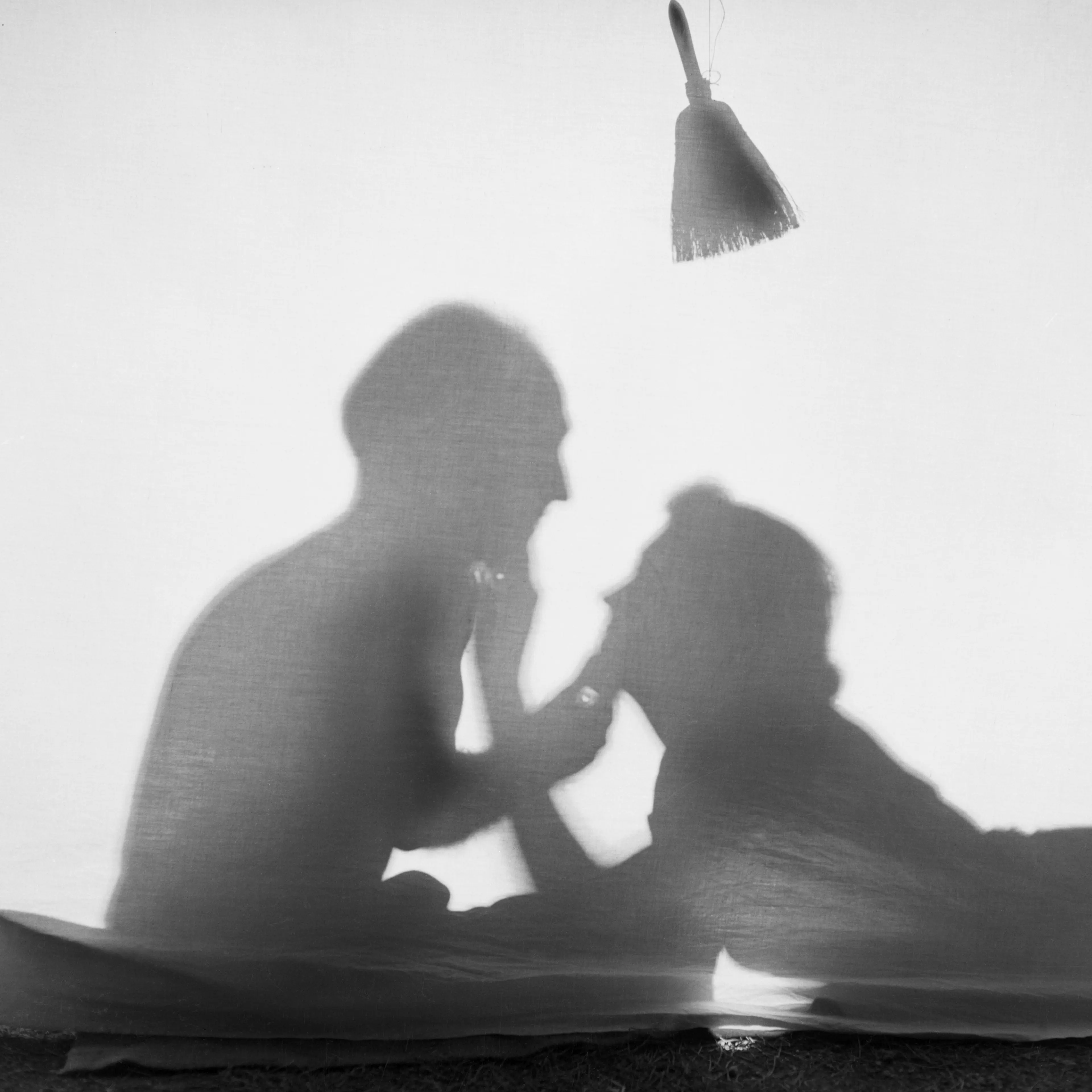 Romantic Couple Silhouetted in a Tent