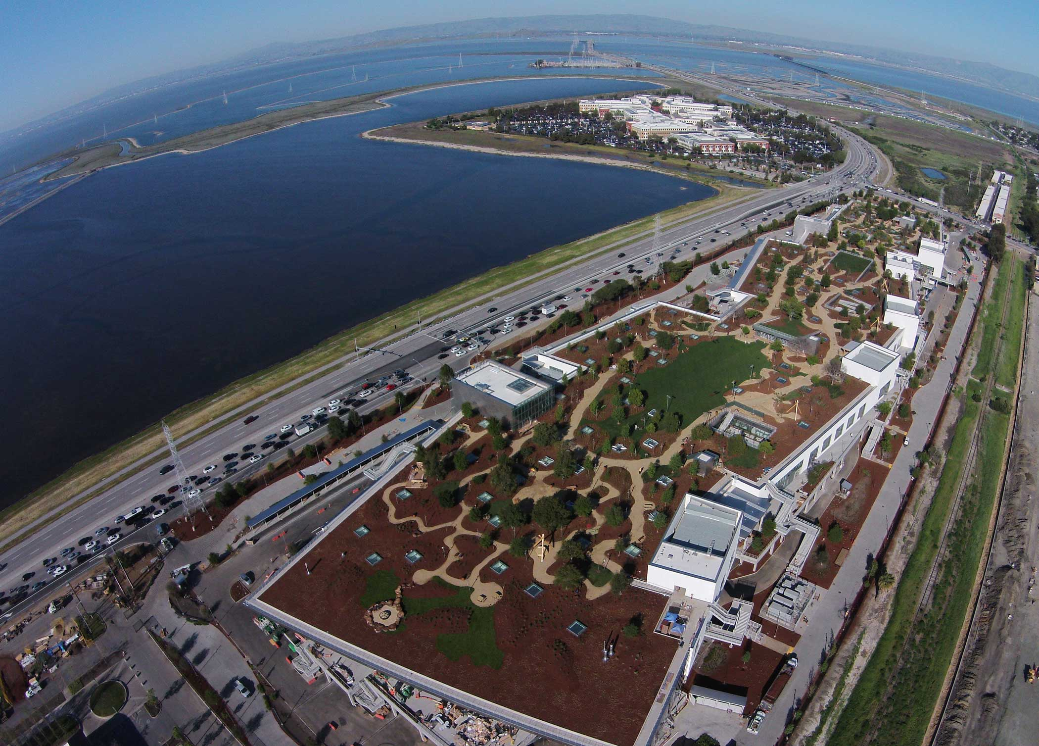 An aerial view of Facebook's new campus, an expansion of its current headquarters in Menlo Park, Calif. The LEED-certified building, known as MPK 20, has a 9-acre "green roof."