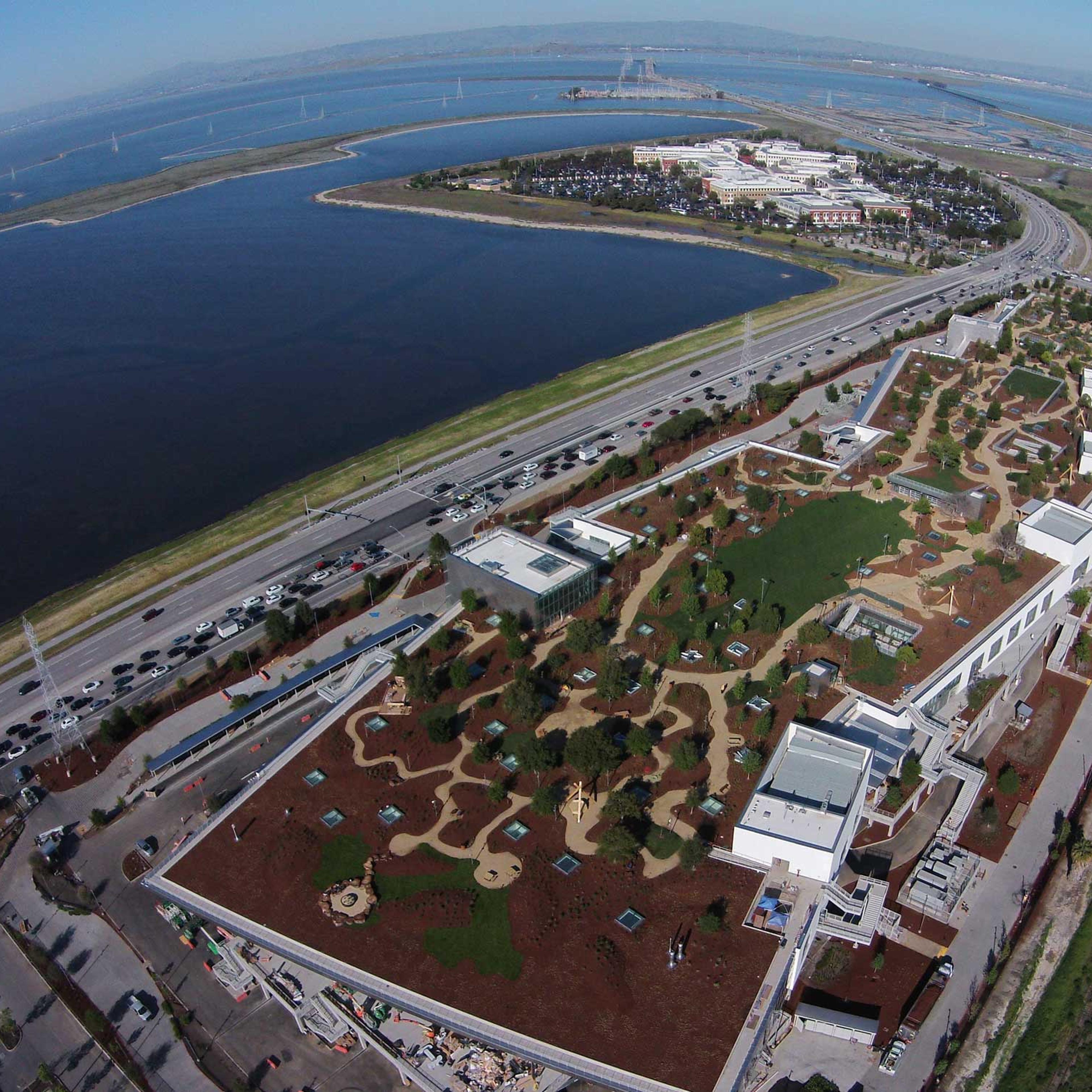 An aerial view of Facebook's new campus, an expansion of its current headquarters in Menlo Park, Calif. The LEED-certified building, known as MPK 20, has a 9-acre "green roof."