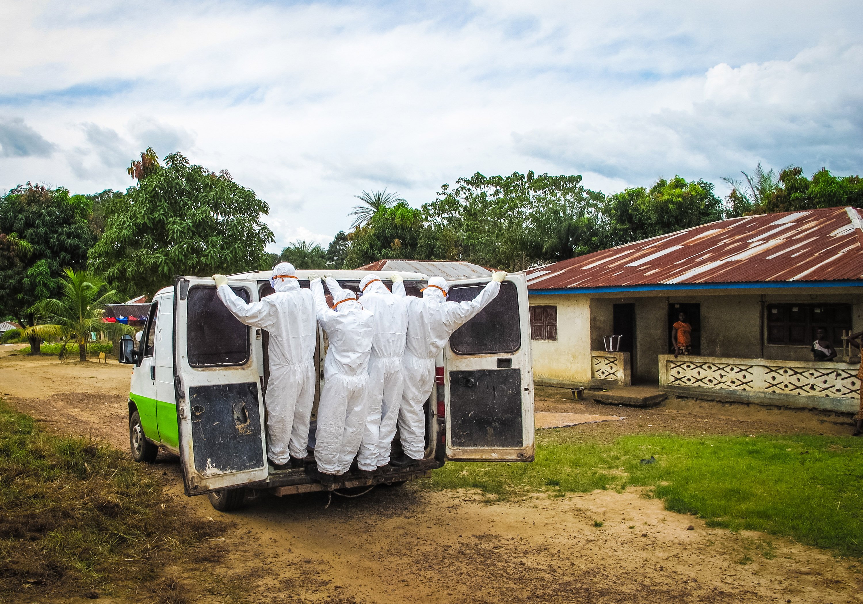 Health workers transport the body of a person suspected to have died of the Ebola virus in Port Loko Community, situated on the outskirts of Freetown, Sierra Leoneon Oct. 21, 2014.