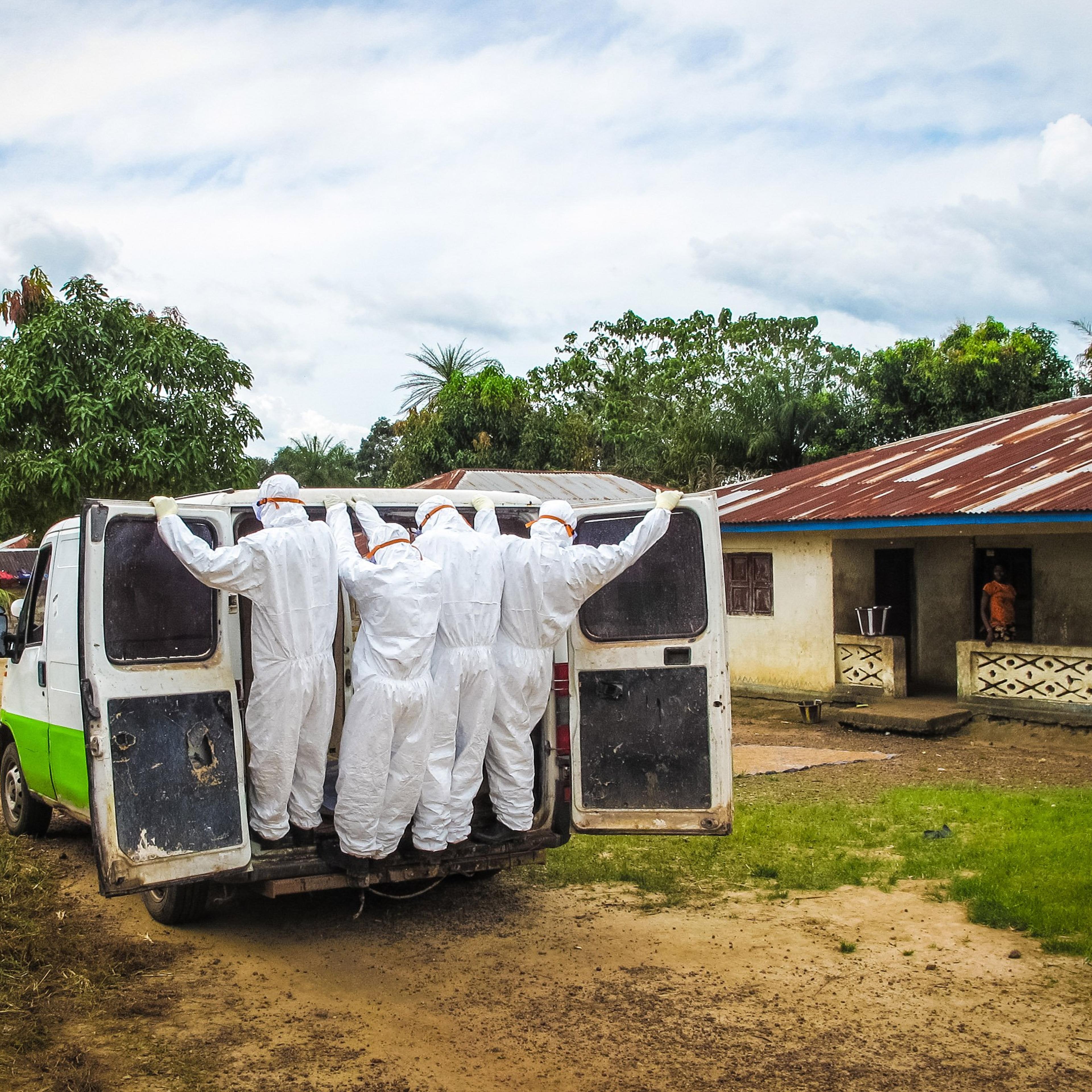 Health workers transport the body of a person suspected to have died of the Ebola virus in Port Loko Community, situated on the outskirts of Freetown, Sierra Leoneon Oct. 21, 2014.