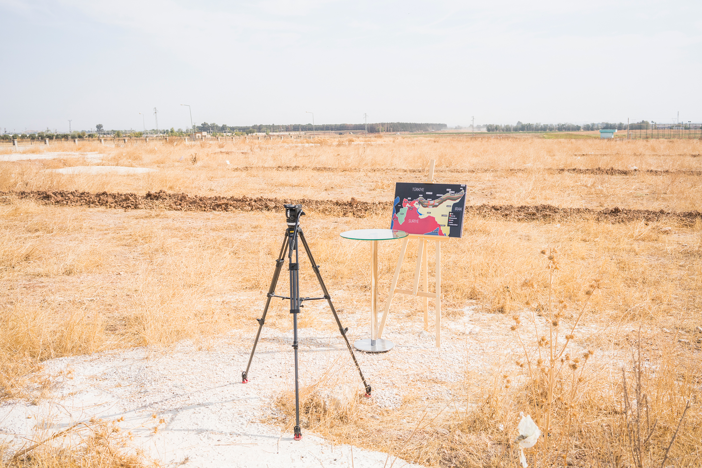 A map showing Turkey's suggested operation in Syria is displayed for a TV broadcast by journalists in Akçakale, southern Turkey, on Oct. 11, 2019.
