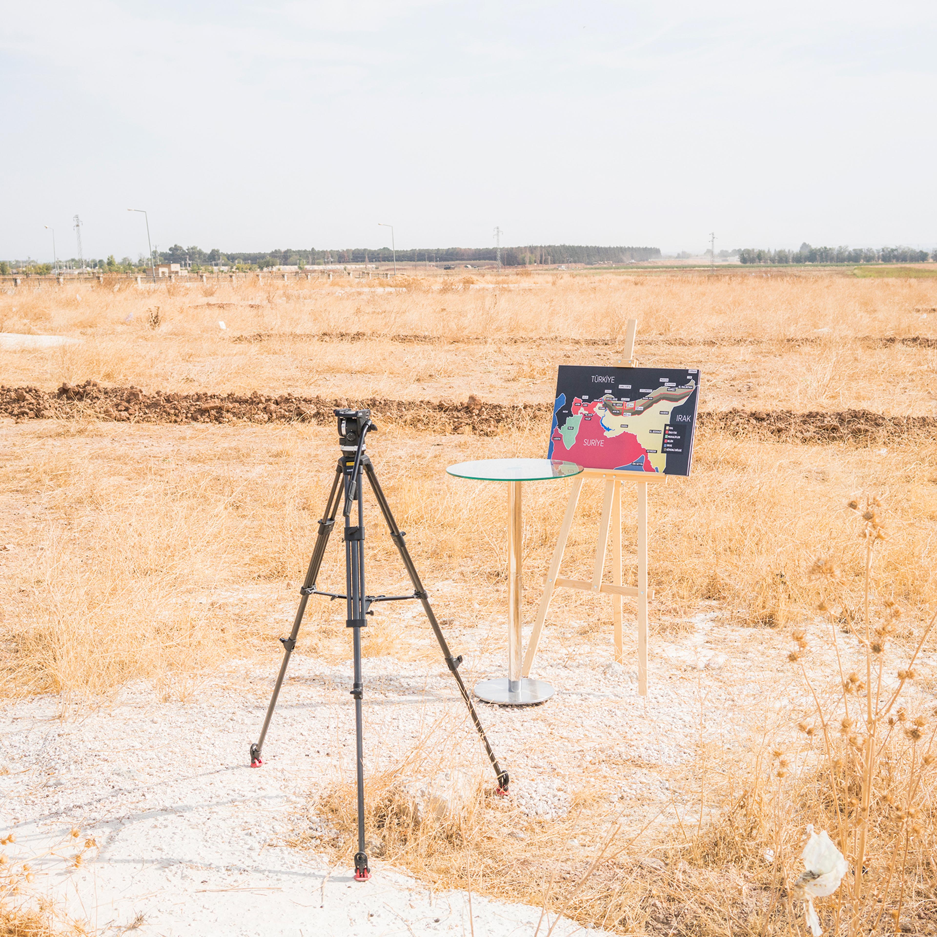A map showing Turkey's suggested operation in Syria is displayed for a TV broadcast by journalists in Akçakale, southern Turkey, on Oct. 11, 2019.