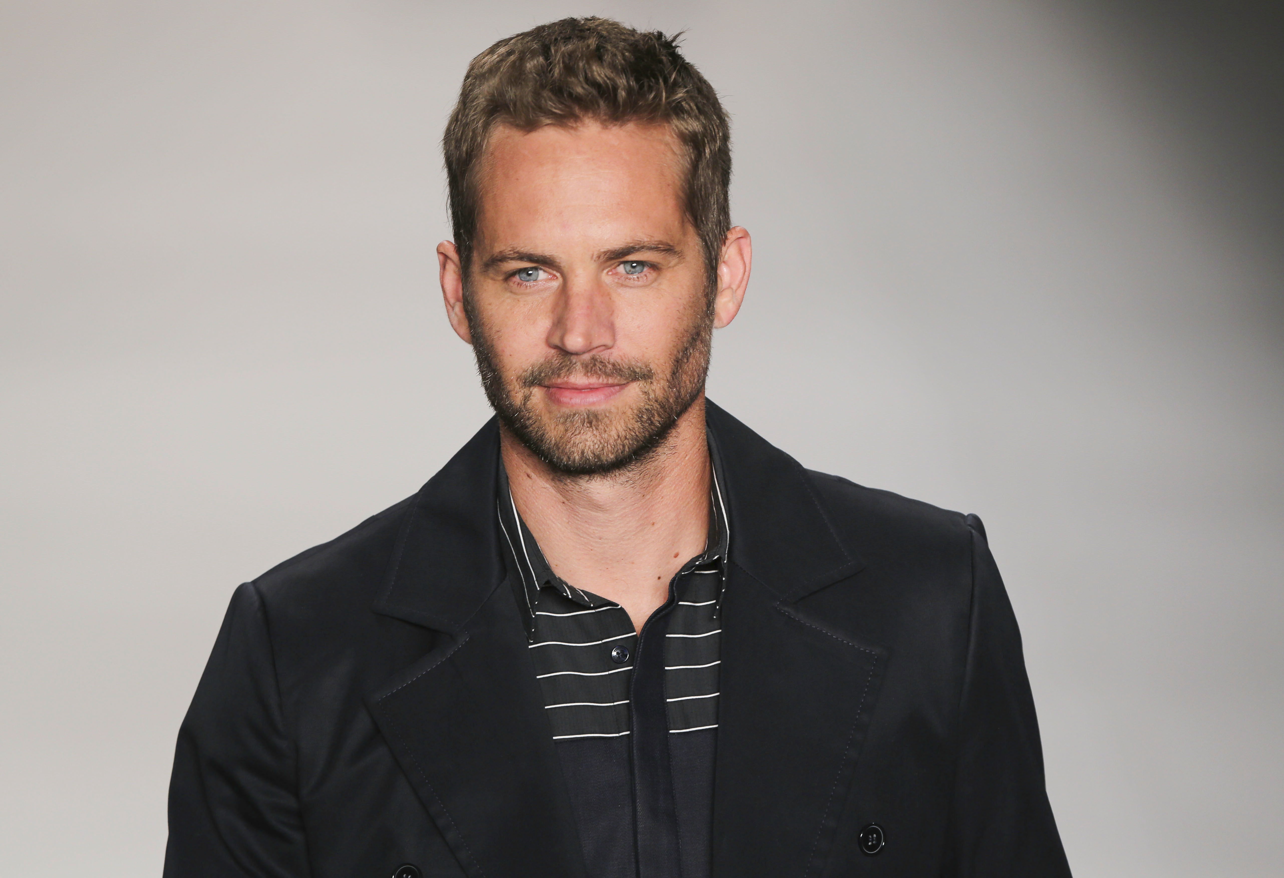 Actor Paul Walker walks the runway at the Samuel Cirnansck show during Sao Paulo Fashion Week Summer on March 21, 2013 in Sao Paulo, Brazil.