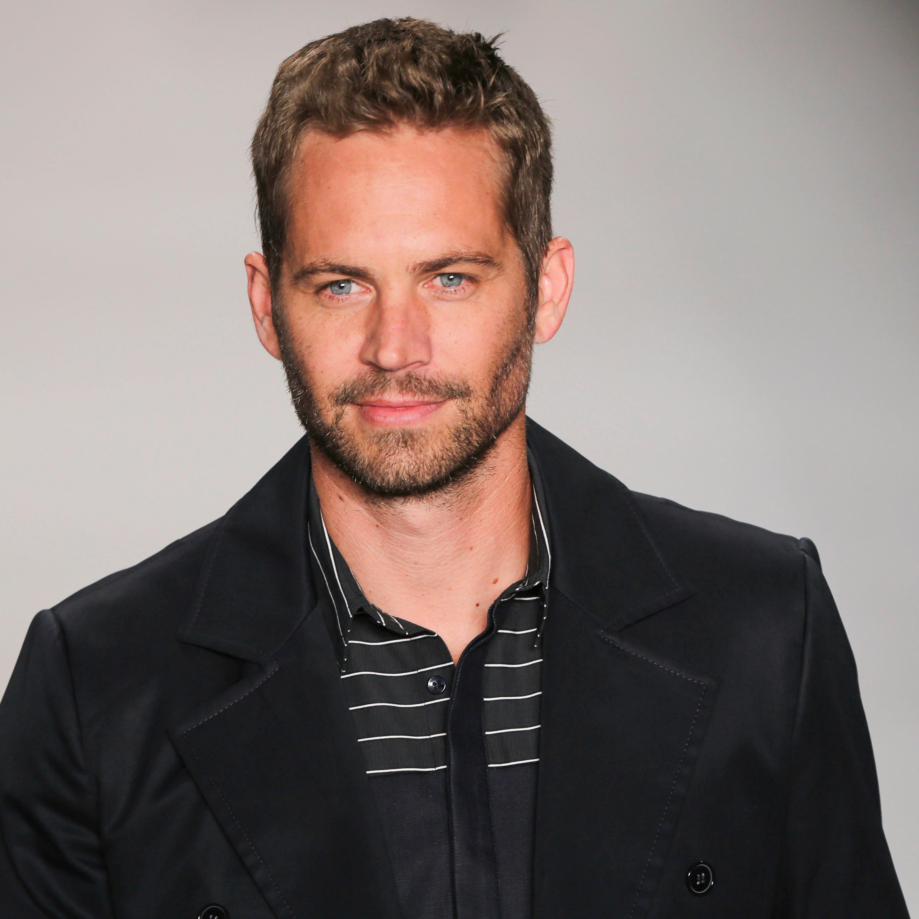Actor Paul Walker walks the runway at the Samuel Cirnansck show during Sao Paulo Fashion Week Summer on March 21, 2013 in Sao Paulo, Brazil.