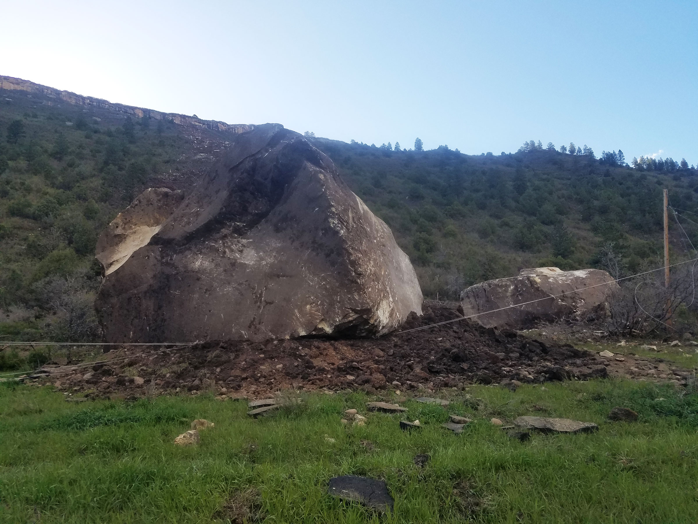 A massive boulder will stay put on Colorado Highway 145.