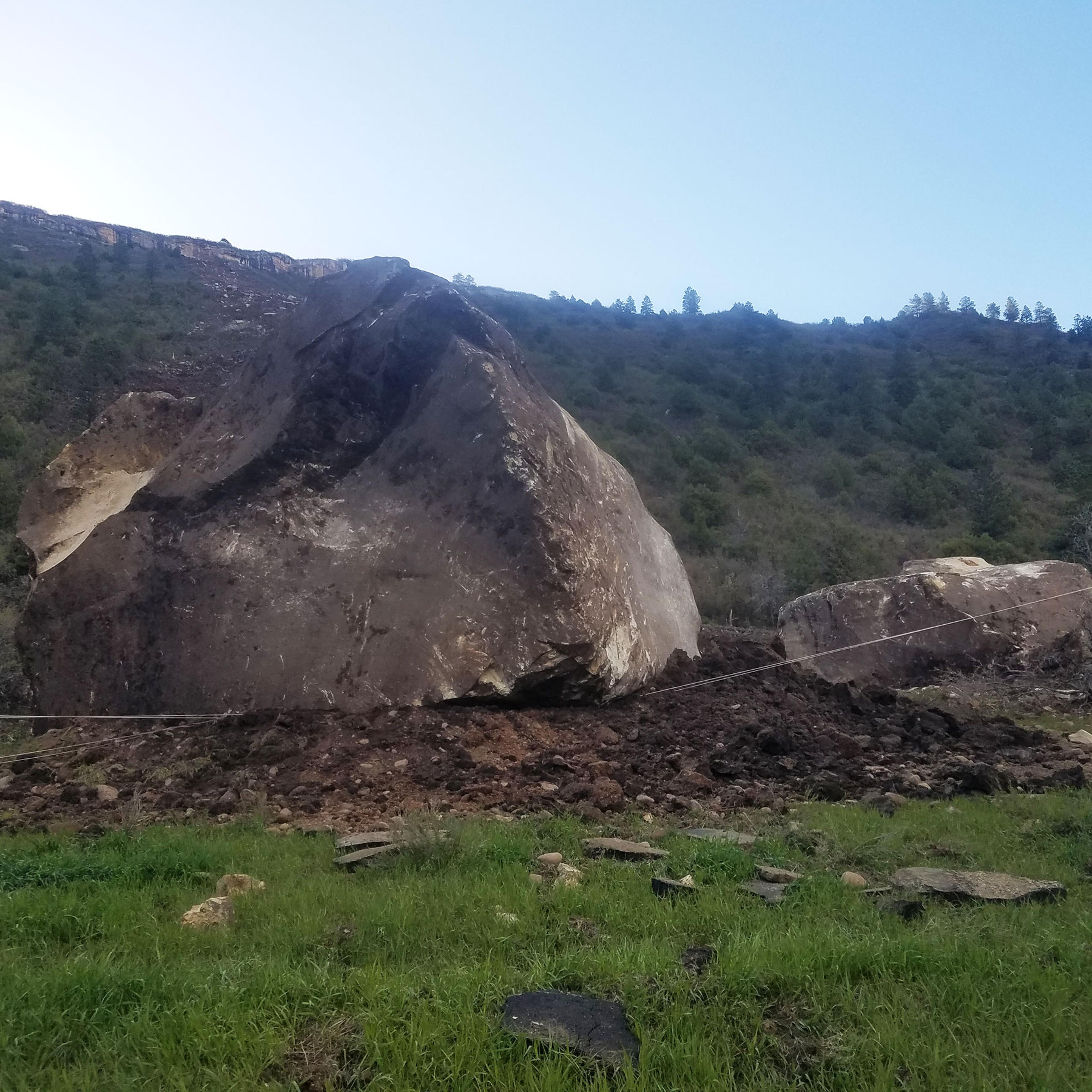 A massive boulder will stay put on Colorado Highway 145.