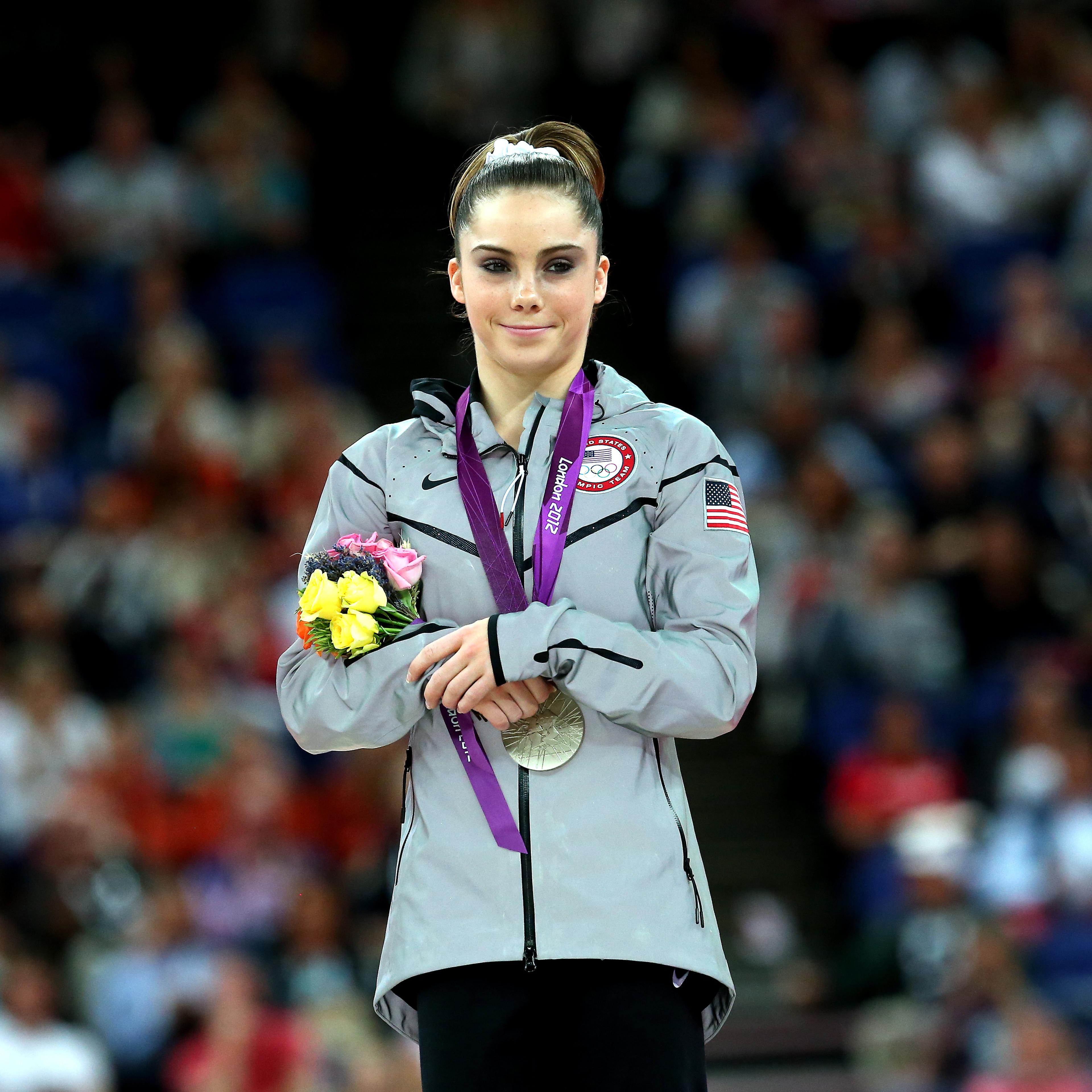 McKayla Maroney stands on the podium with her silver medal during the medal ceremony following the Artistic Gymnastics Women's Vault final of the London 2012 Olympic Games at North Greenwich Arena on August 5, 2012 in London, England.