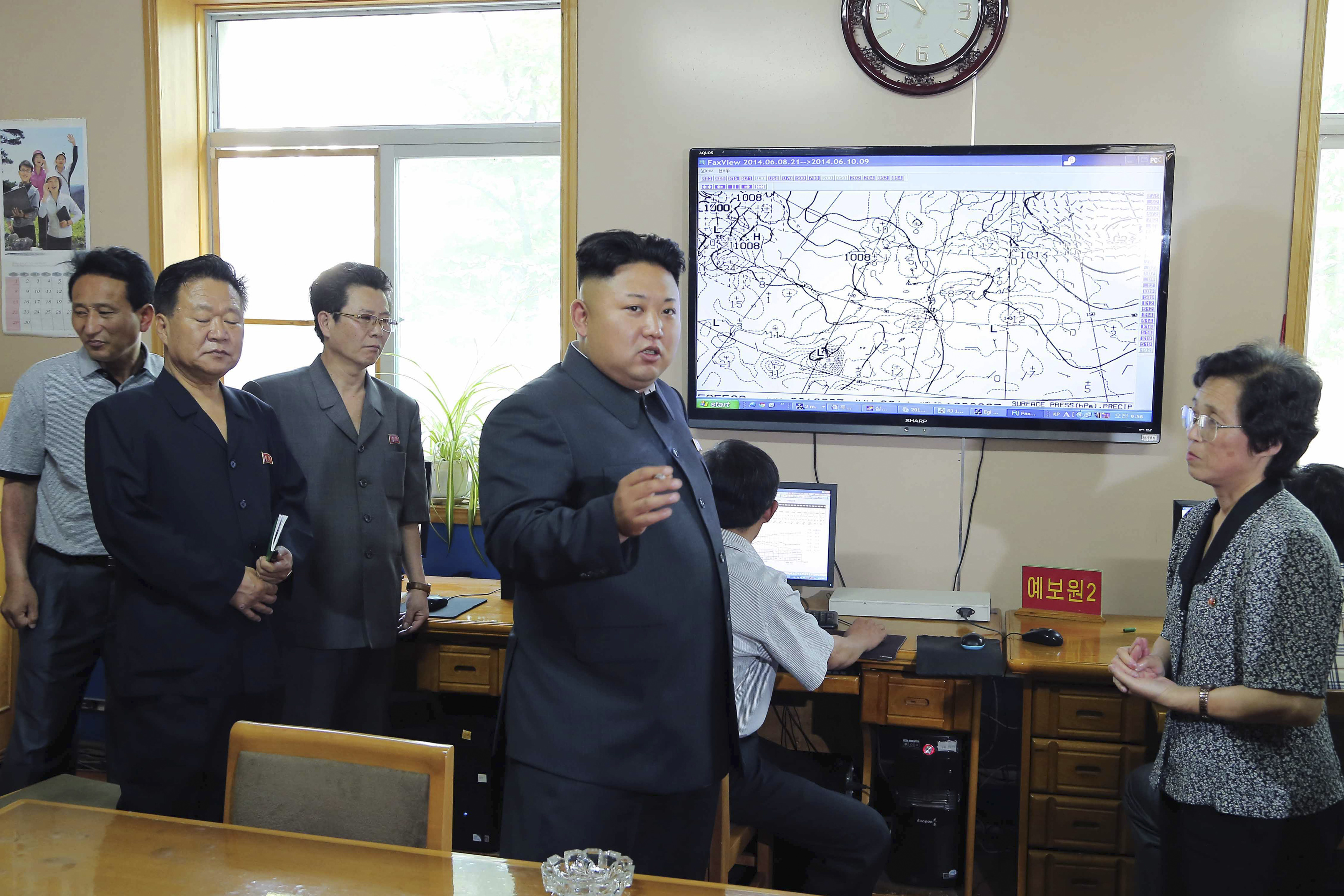 North Korean leader Kim Jong Un gives field guidance to the Hydro-meteorological Service in this undated photo released by North Korea's KCNA in Pyongyang
