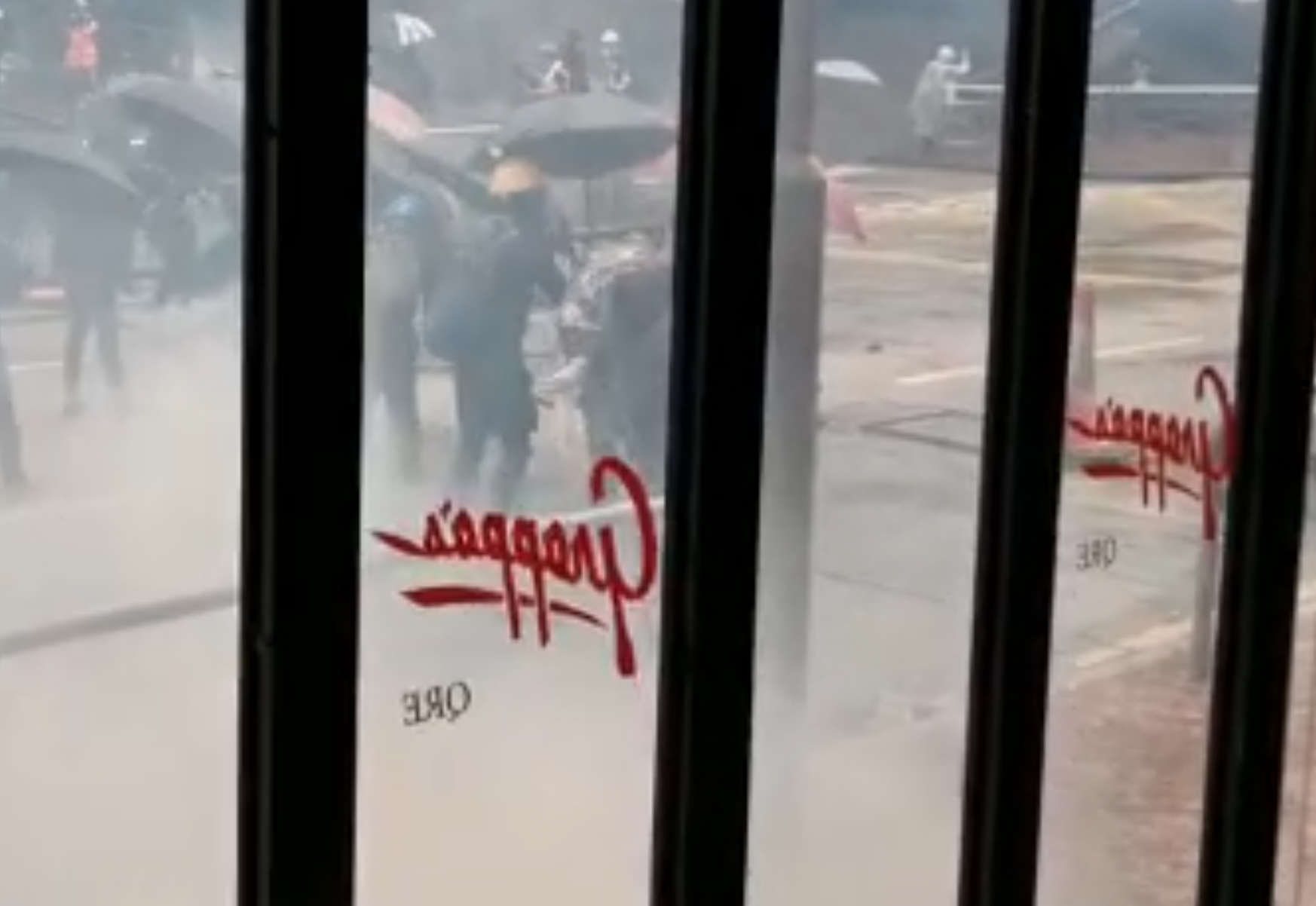 Still from a video filmed from inside Grappa's restaurant of the Hong Kong protests on Oct. 6, 2019