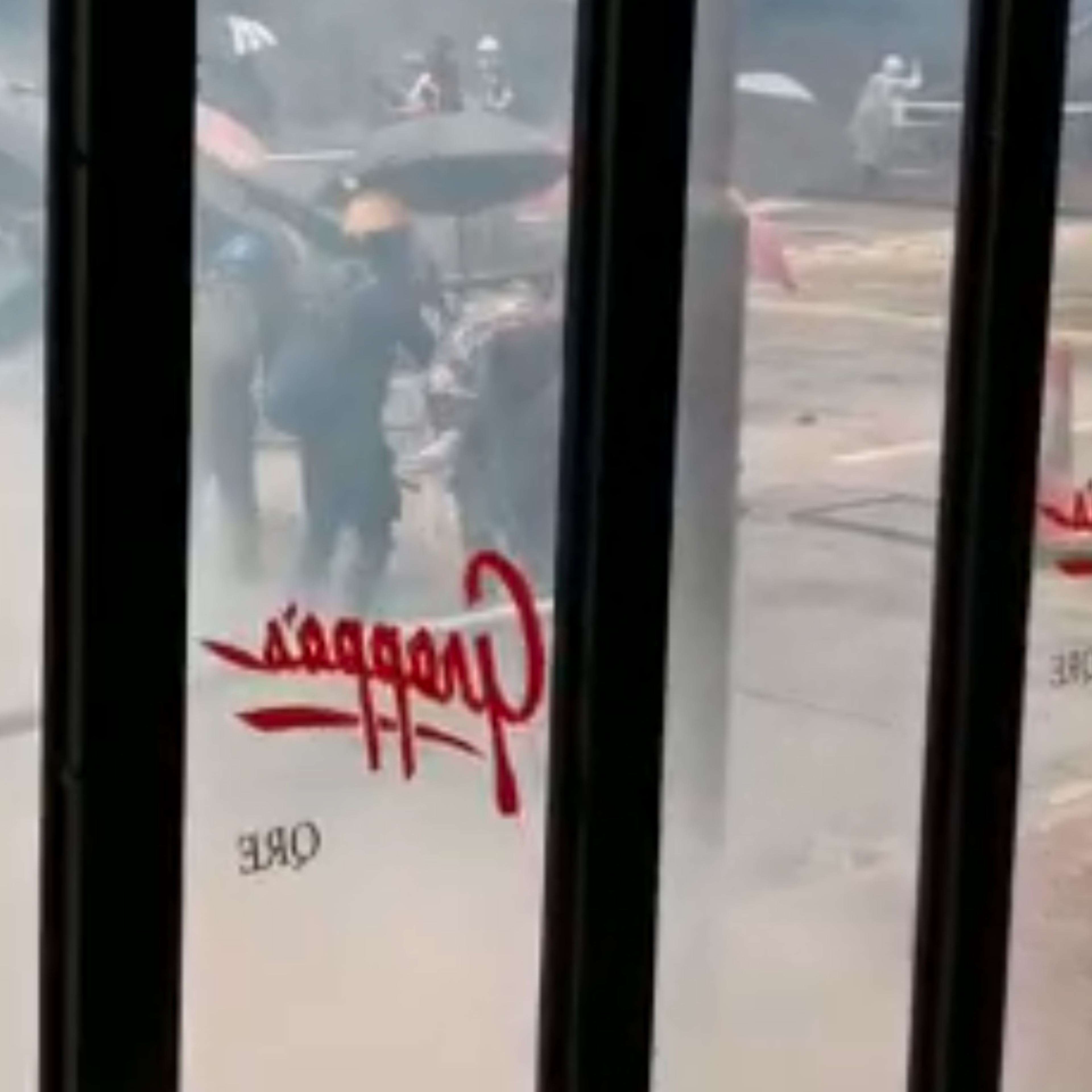 Still from a video filmed from inside Grappa's restaurant of the Hong Kong protests on Oct. 6, 2019