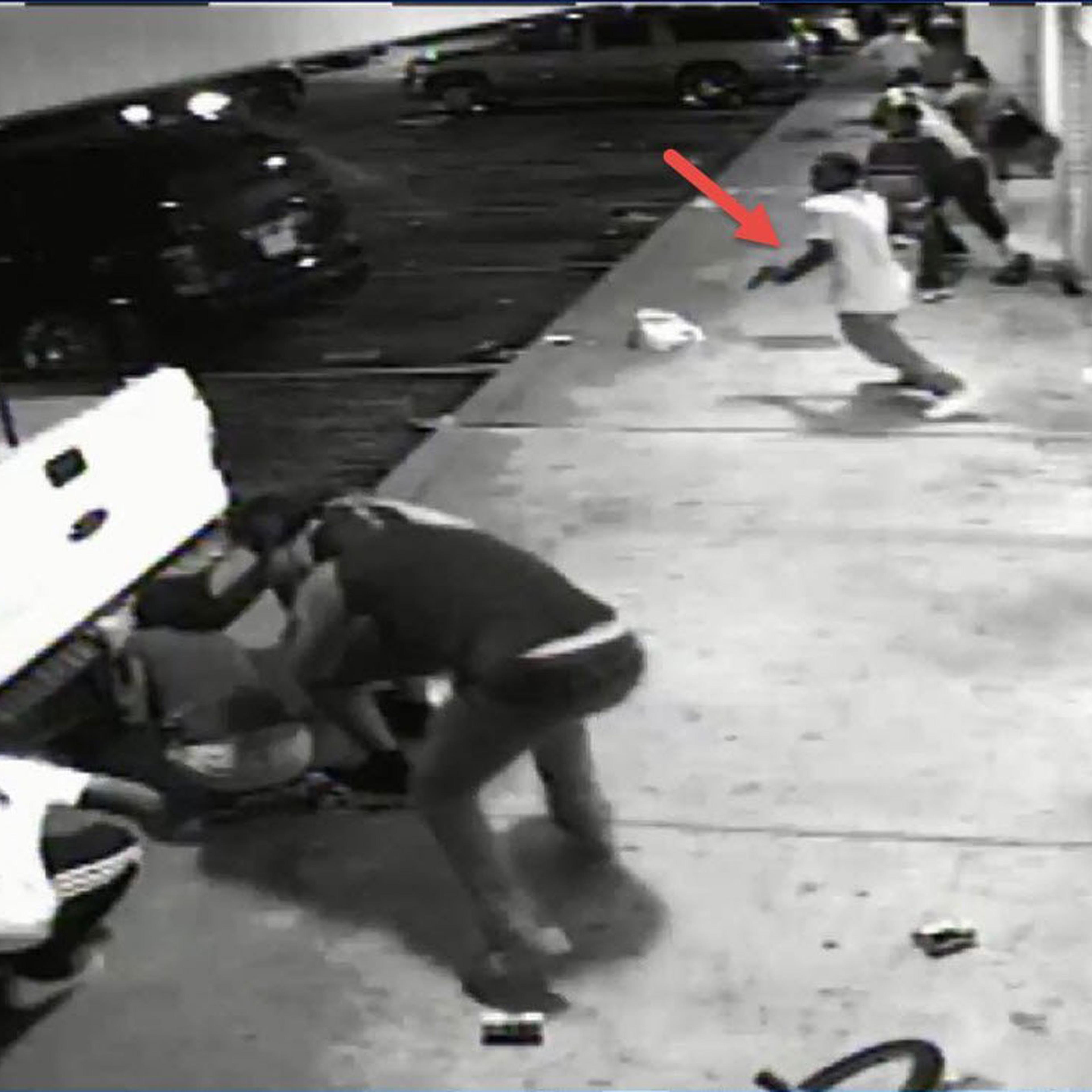 ST. LOUIS, MO - AUGUST 09: In this handout provided by the St. Louis County Police Department, video surveillance taken from Solo Insurance Services, appears to show Tyrone Harris Jr. grab a handgun out of his waistband once shots are fired during the pr