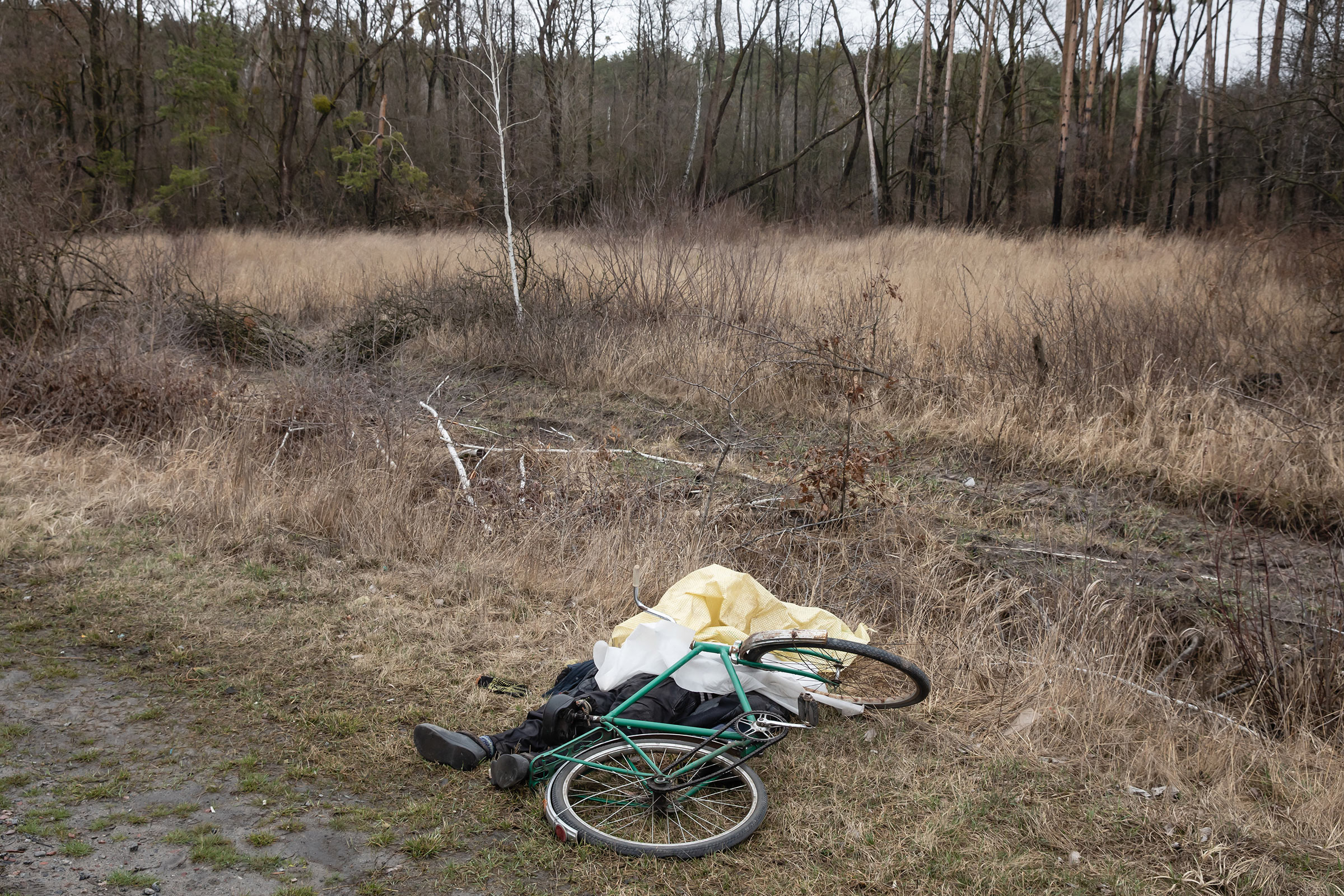 A dead civilian is seen next to his bicycle in Bucha, Ukraine, April 2, 2022.