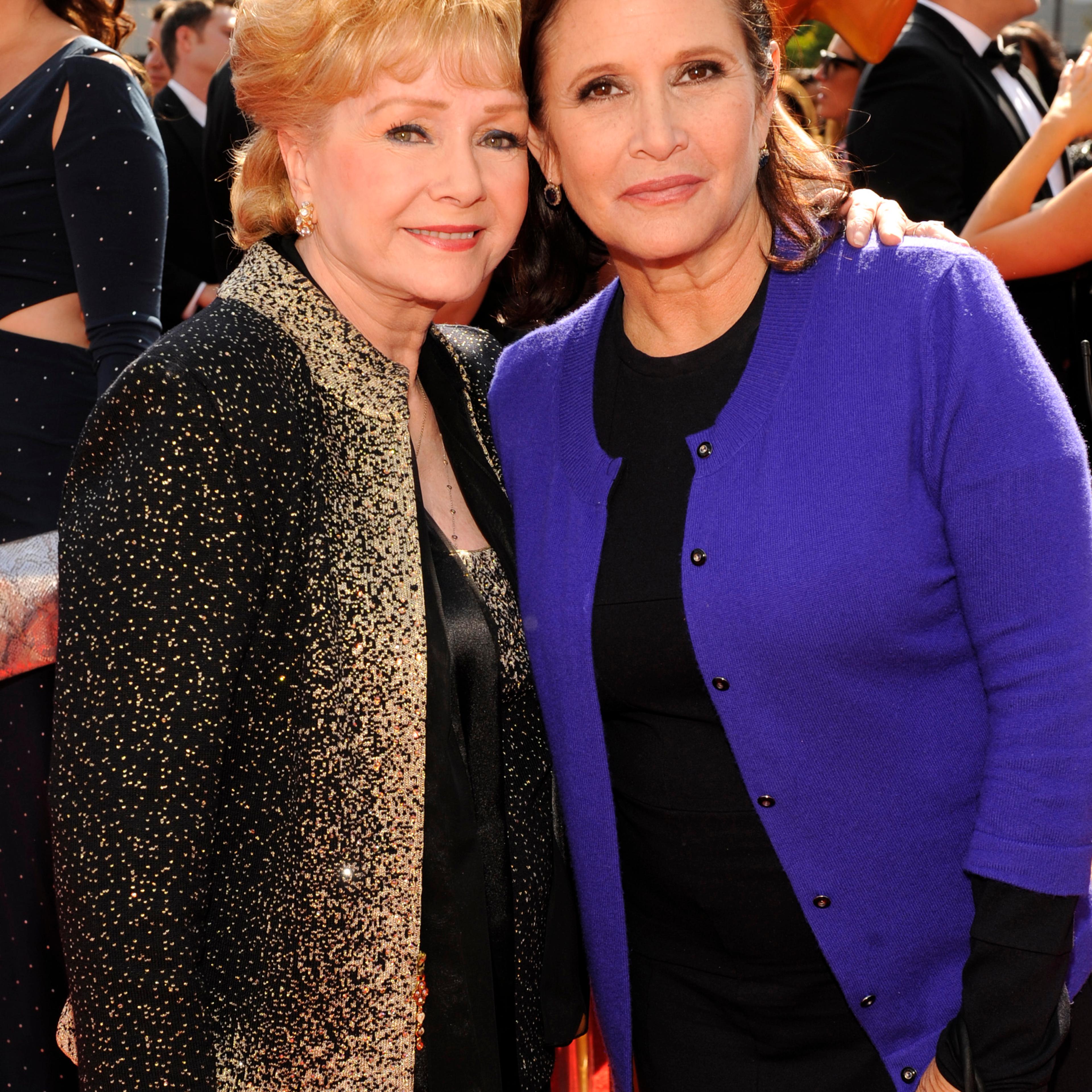 (L-R) Debbie Reynolds and Carrie Fisher attends the Emmy Awards in Los Angeles on Sept. 10, 2011.