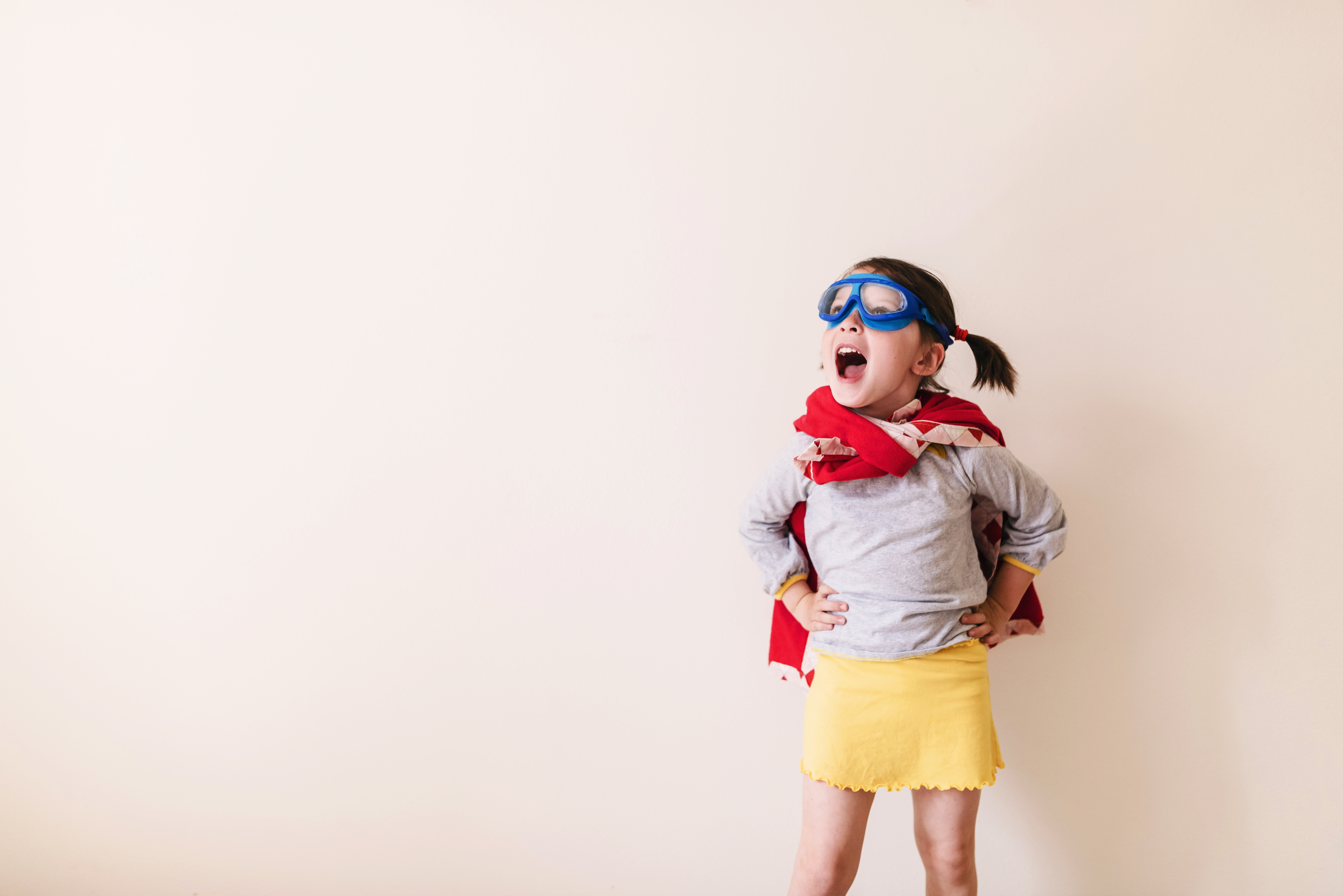 Girl dressed as superhero