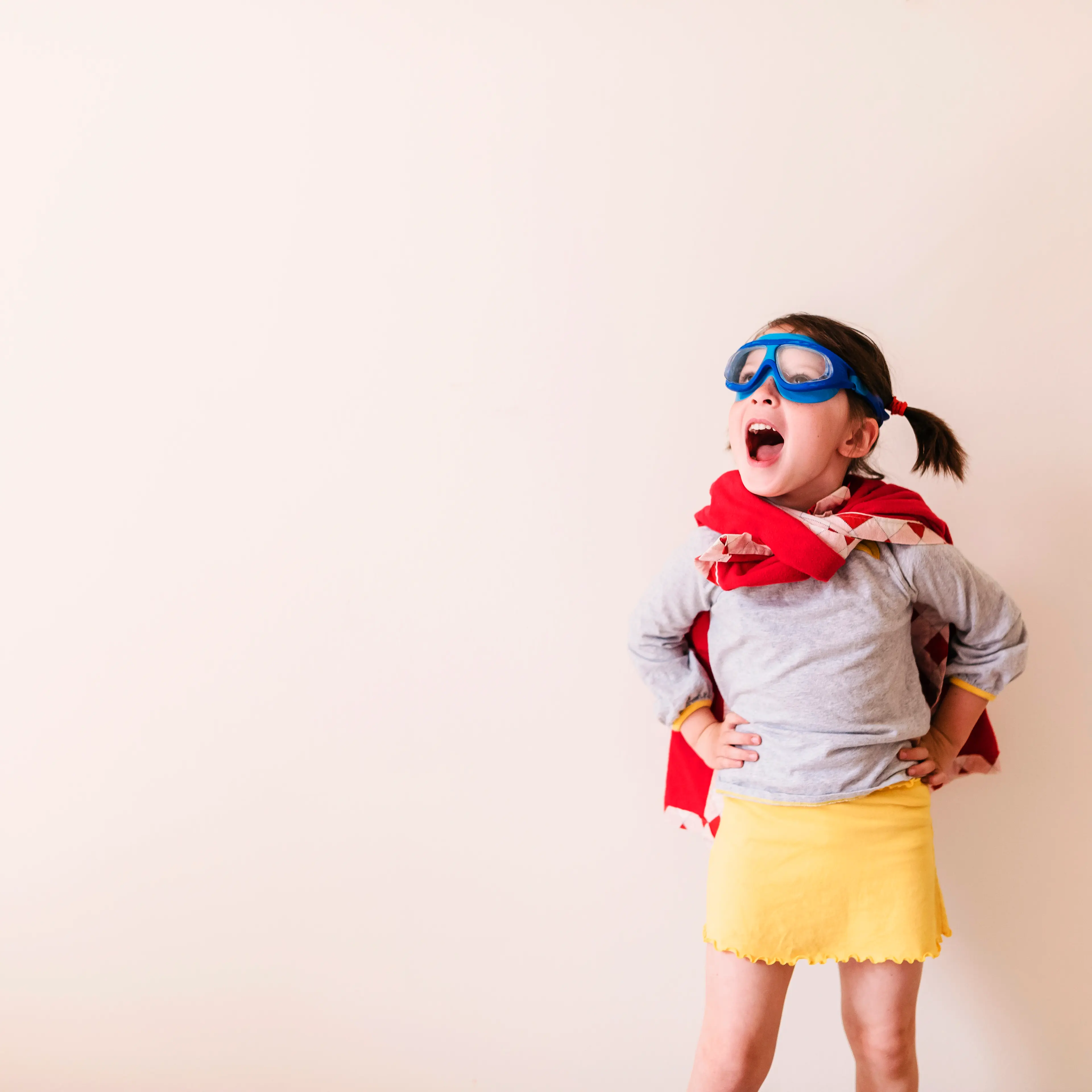 Girl dressed as superhero