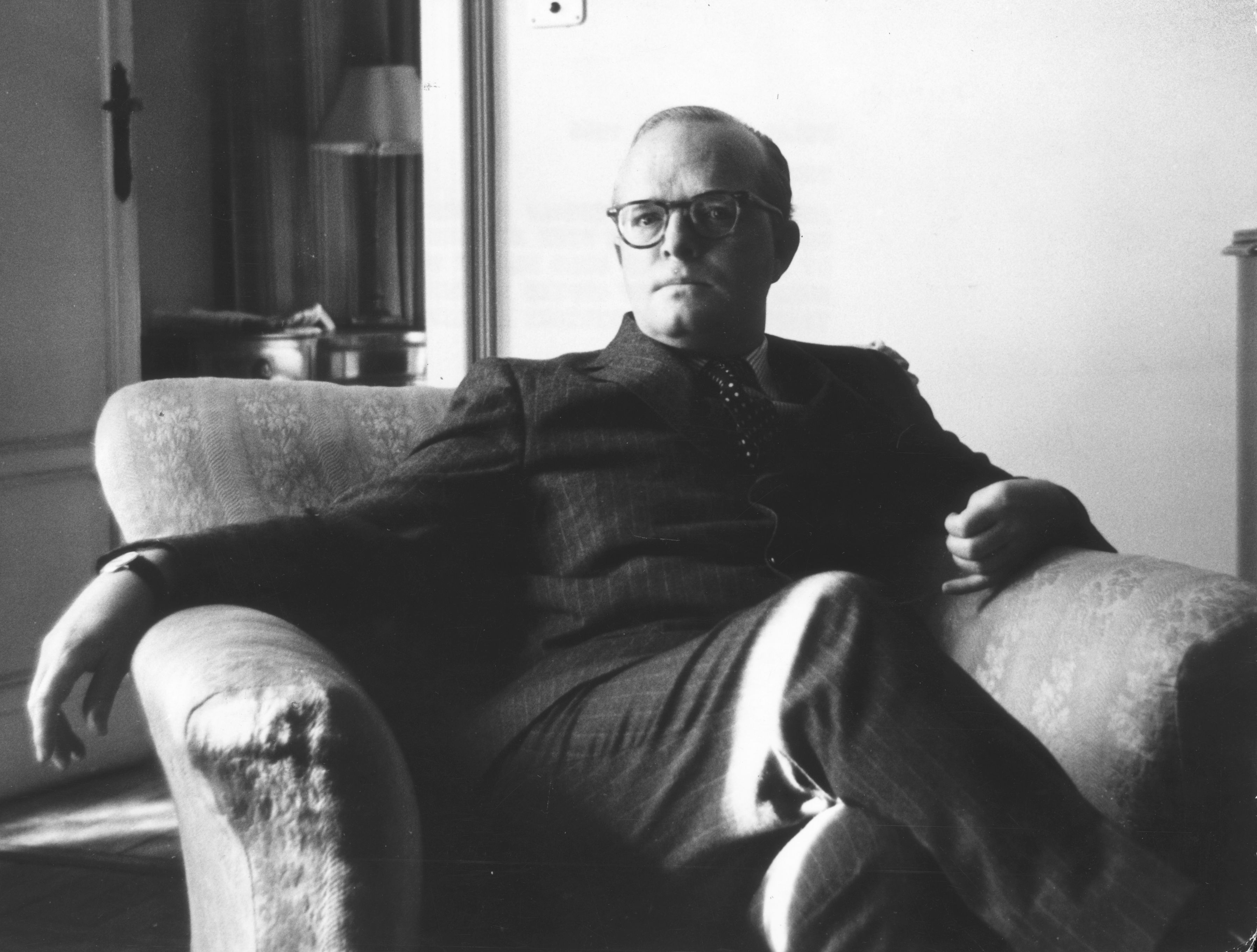 American writer Truman Capote (1924 - 1984), the author of 'Breakfast At Tiffany's' in Milan negotiating a contract for his new nonfiction novel 'In Cold Blood'.