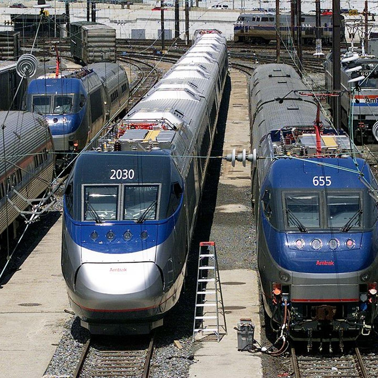 An Amtrak high-speed Acela train (center) in Philadelphia's