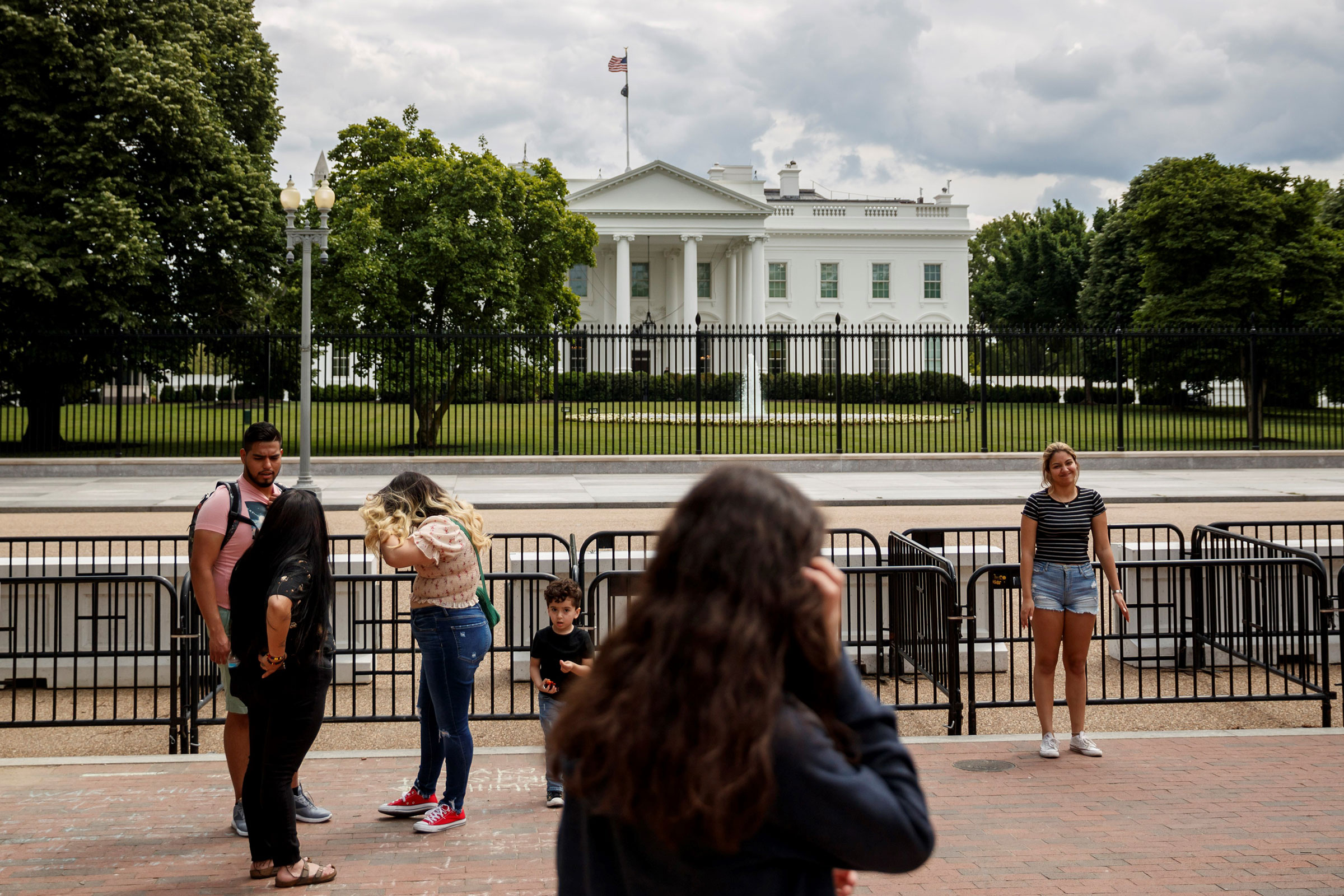 People are seen near the White House in Washington, on May 17, 2021.